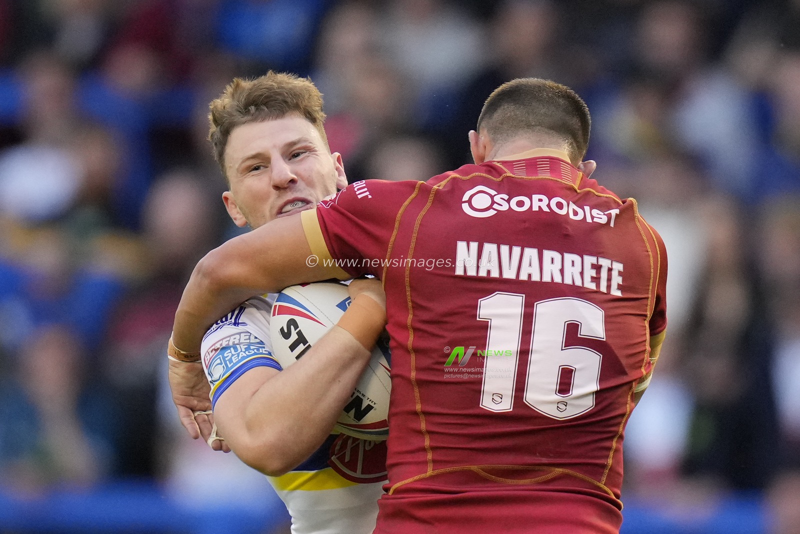 George Williams #6 of Warrington Wolves is tackled by Romain Navarrete #16 of Catalans Dragons during the Betfred Super League Round 21 match Warrington Wolves vs Catalans Dragons at Halliwell Jones Stadium, Warrington, United Kingdom, 4th August 2023

(Photo by Steve Flynn/News Images)