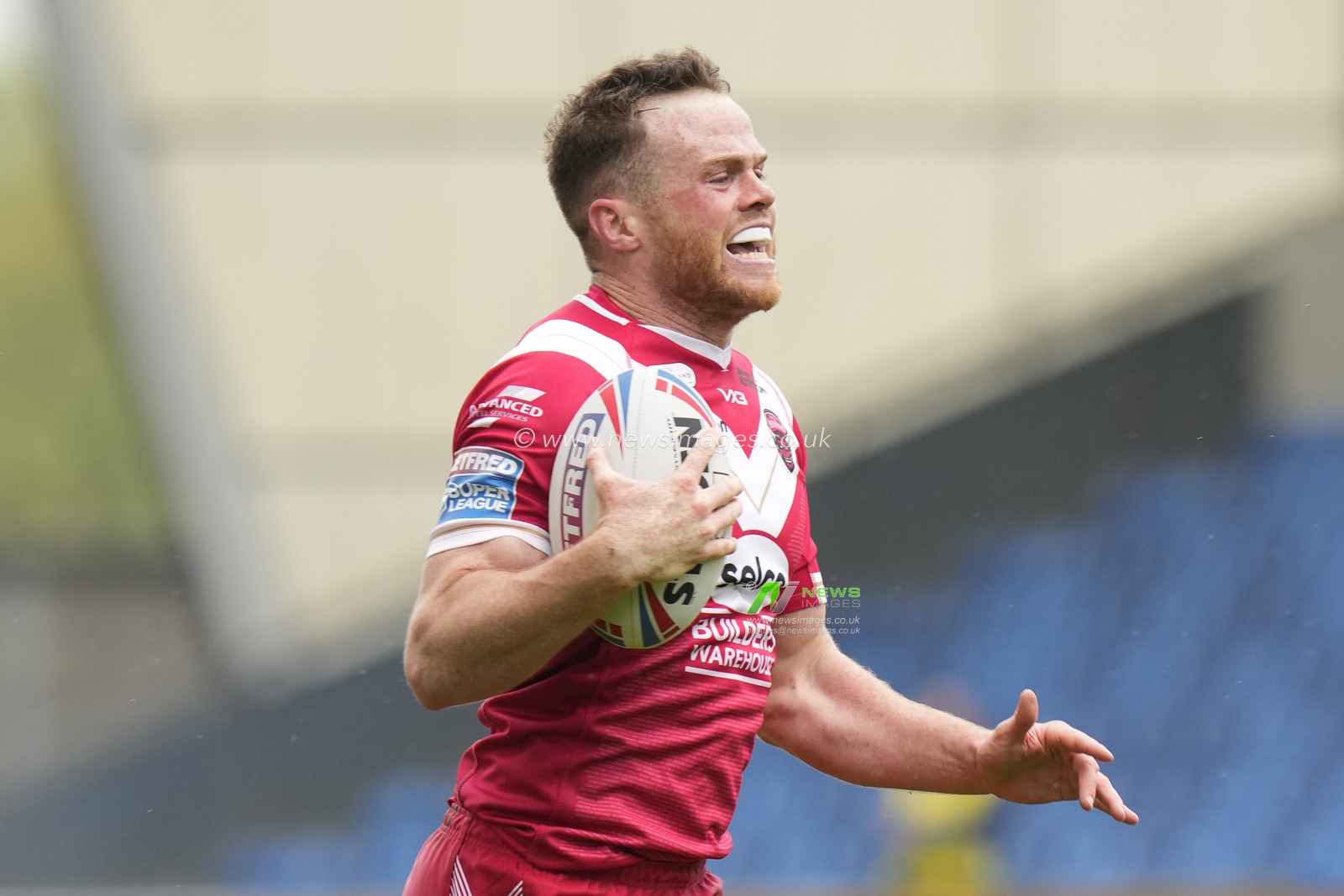 Joe Burgess #5 of Salford Red Devils makes a break to score a try during the Betfred Super League Round 10 match Salford Red Devils vs Catalans Dragons at AJ Bell Stadium, Eccles, United Kingdom, 23rd April 2023

(Photo by Steve Flynn/News Images)