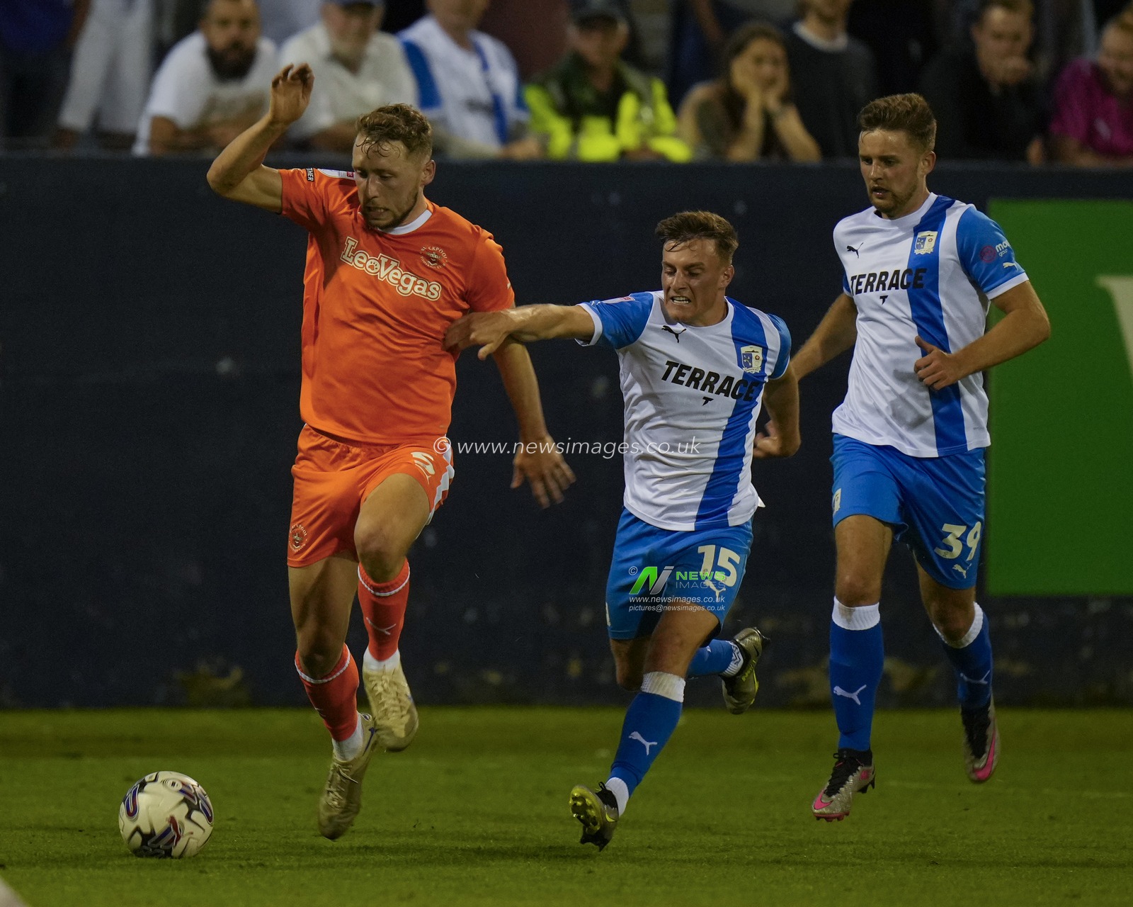 Matthew Pennington #5 of Blackpool breaks past Robbie Gotts #15 of Barrow during the EFL Trophy match Barrow vs Blackpool at SO Legal Stadium, Barrow-in-Furness, United Kingdom, 5th September 2023

(Photo by Steve Flynn/News Images)