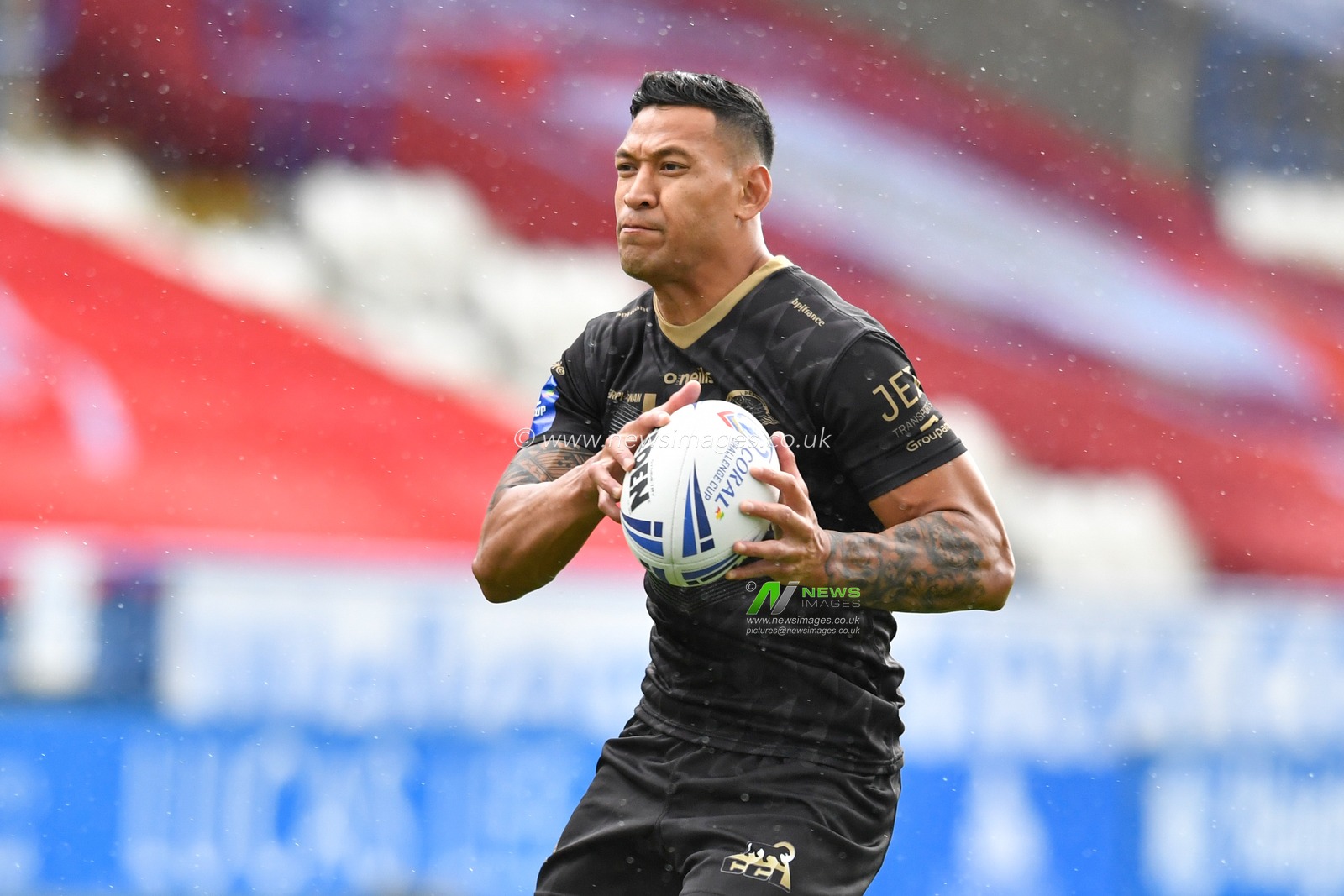 Israel Folau (4) of Catalans Dragons warming up before the game