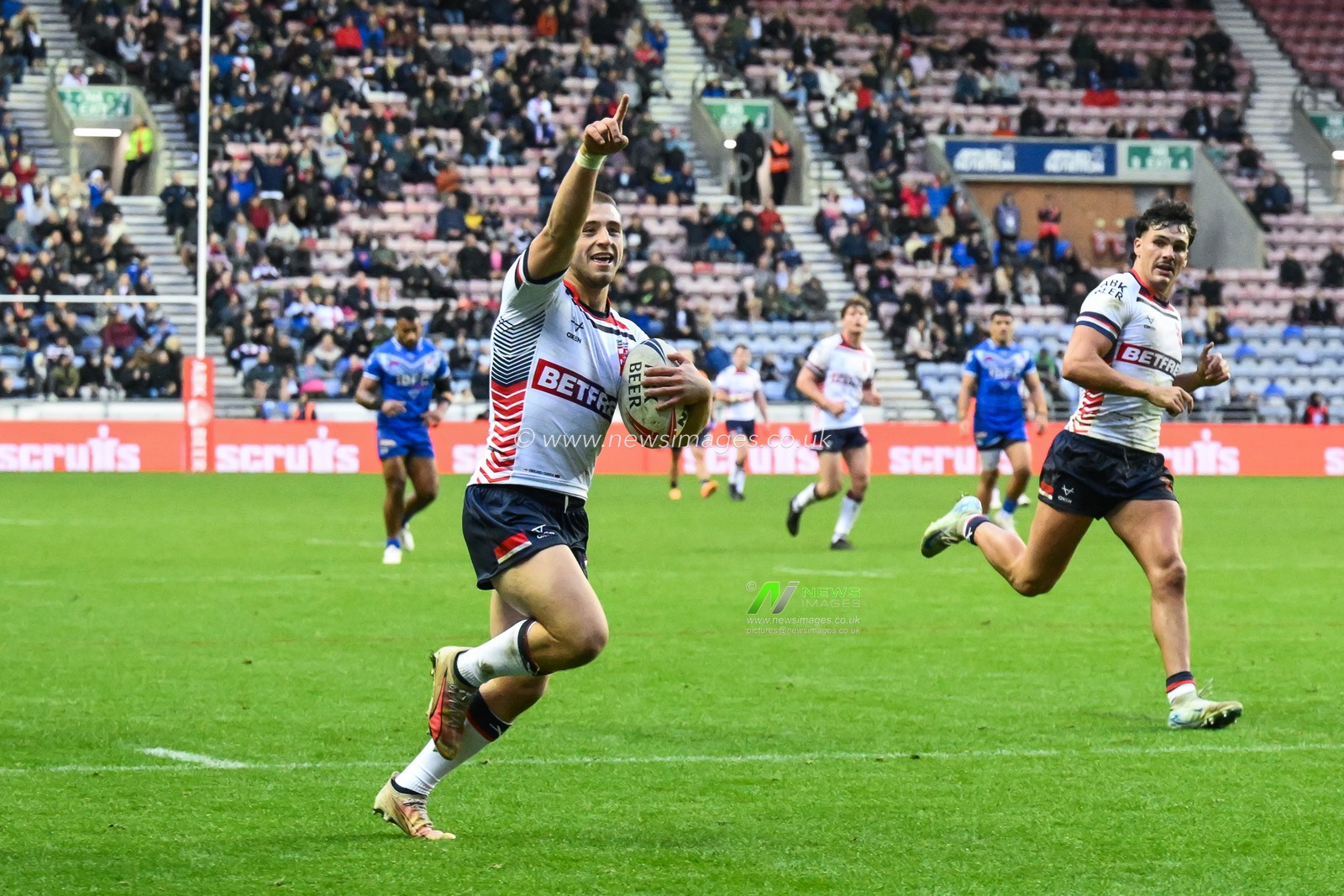 Mikey Lewis of England celebrates as he scores a try during the ABK Beer Internationals Series match England vs Samoa at The Brick Community Stadium, Wigan, United Kingdom, 27th October 2024

(Photo by Craig Thomas/News Images)