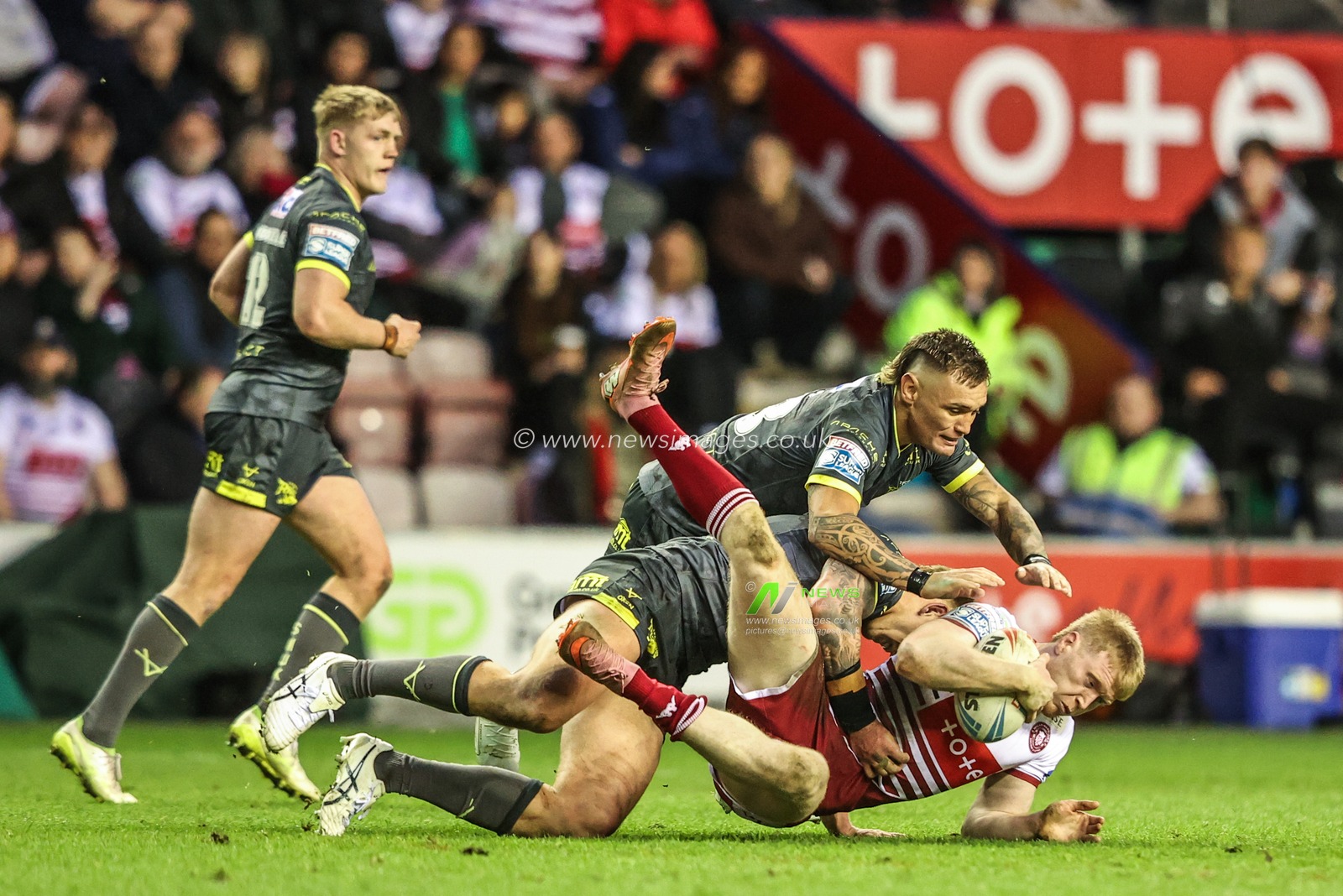 Zach Eckersley of Wigan Warriors is tackled by Danny Levi of Leeds Rhinos during the Betfred Super League round 11 match Wigan Warriors vs Leeds Rhinos at The Brick Community Stadium, Wigan, United Kingdom on 15 May 2026

(Photo by Alfie Cosgrove/News Images)