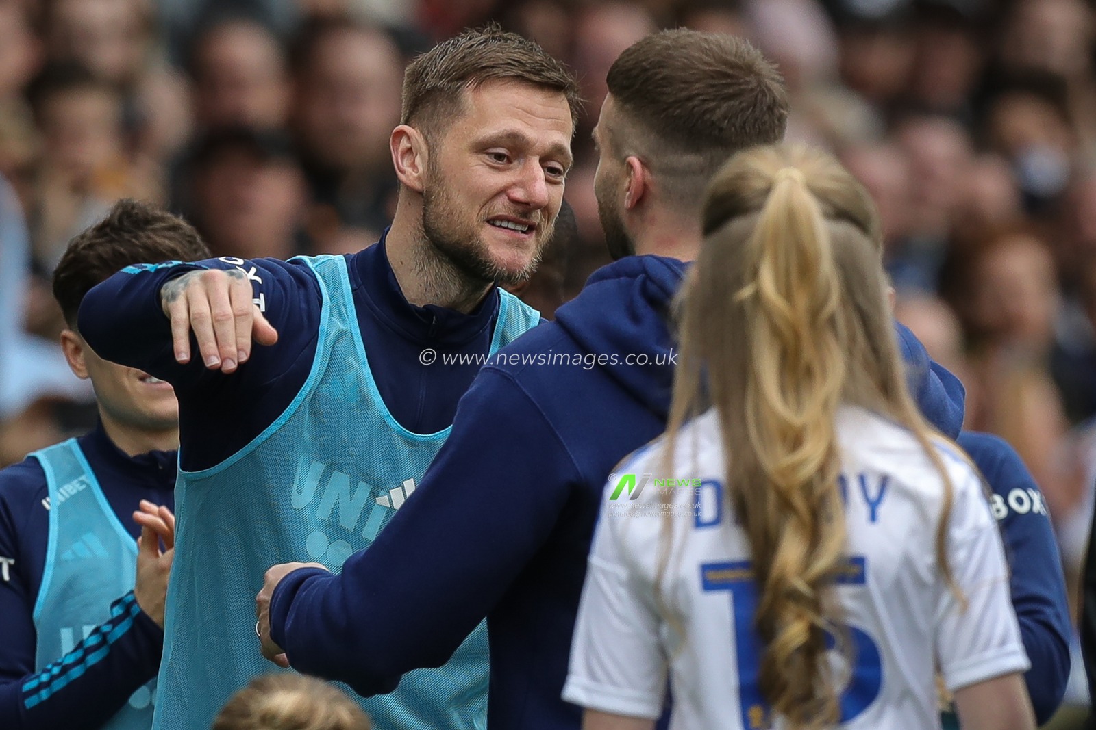 Stuart Dallas of Leeds United hugs team mate Liam Cooper inside Elland Road Stadium during a lap of honour after announcing his retirement from the game this week during the Sky Bet Championship match Leeds United vs Blackburn Rovers at Elland Road, Leeds, United Kingdom, 13th April 2024

(Photo by James Heaton/News Images)