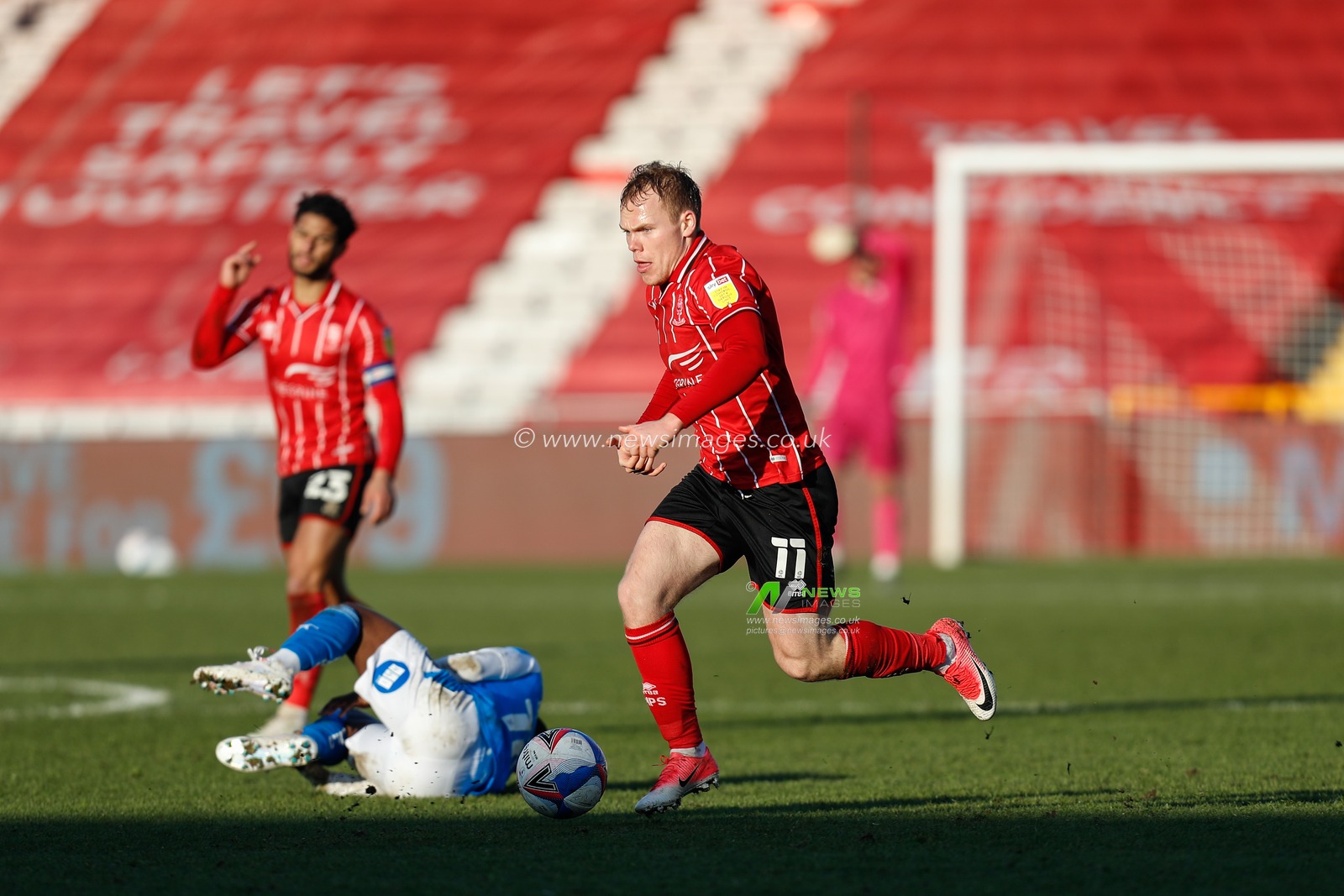 Anthony Scully #11 of Lincoln City on the attack