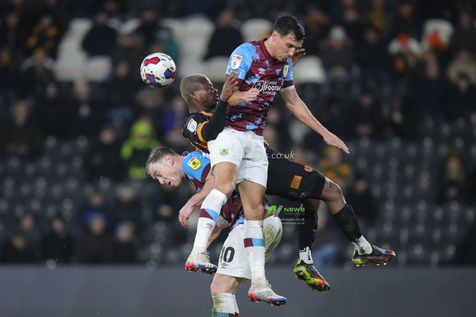 Jean MichaÃ«l Seri #24 of Hull City is fouled during the Sky Bet Championship match Hull City vs Burnley at MKM Stadium, Hull, United Kingdom, 15th March 2023

(Photo by James Heaton/News Images)