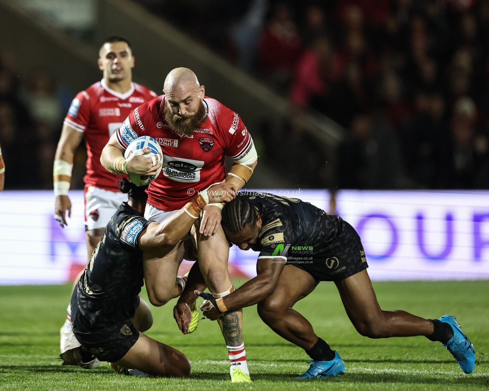 Gil Dudson of Salford Red Devils in action during the Betfred Super League play-off Eliminator 1 Salford Red Devils v Leigh Leopards at Salford Community Stadium, Eccles, United Kingdom, 27th September 2024

(Photo by Mark Cosgrove/News Images)