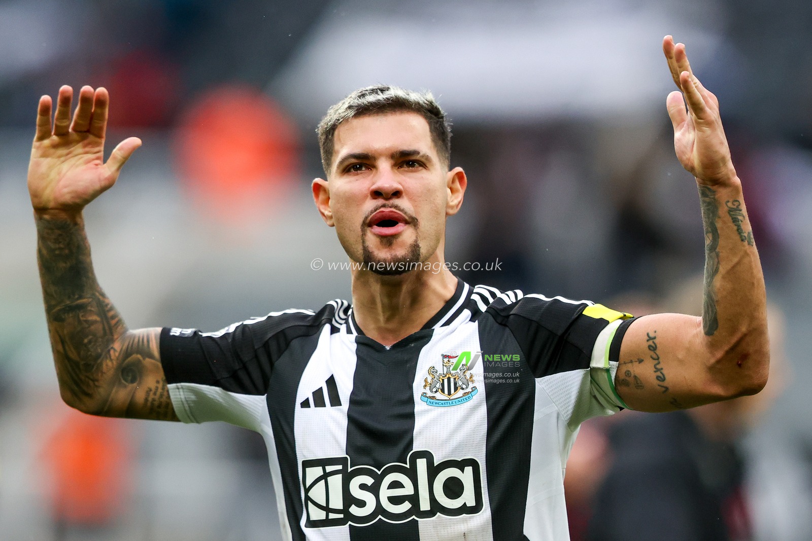 Bruno Guimaraes of Newcastle United celebrates with fans after the teams victory following the Premier League match Newcastle United vs Nottingham Forest at St. James's Park, Newcastle, United Kingdom, 23rd February 2025

(Photo by Alfie Cosgrove/News Images)