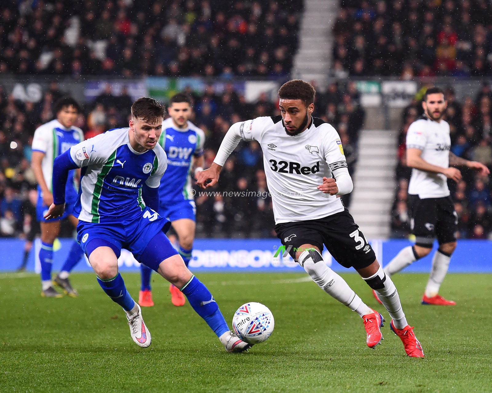 5th March 2019, Pride Park, Derby, England; Sky Bet Championship, Derby County vs Wigan Athletic ; Jayden Bogle (37) of Derby County makes a run with Lee Evans (36) of Wigan looking to make a tackle

Credit: Jon Hobley/News Images 

English Football League images are subject to DataCo Licence