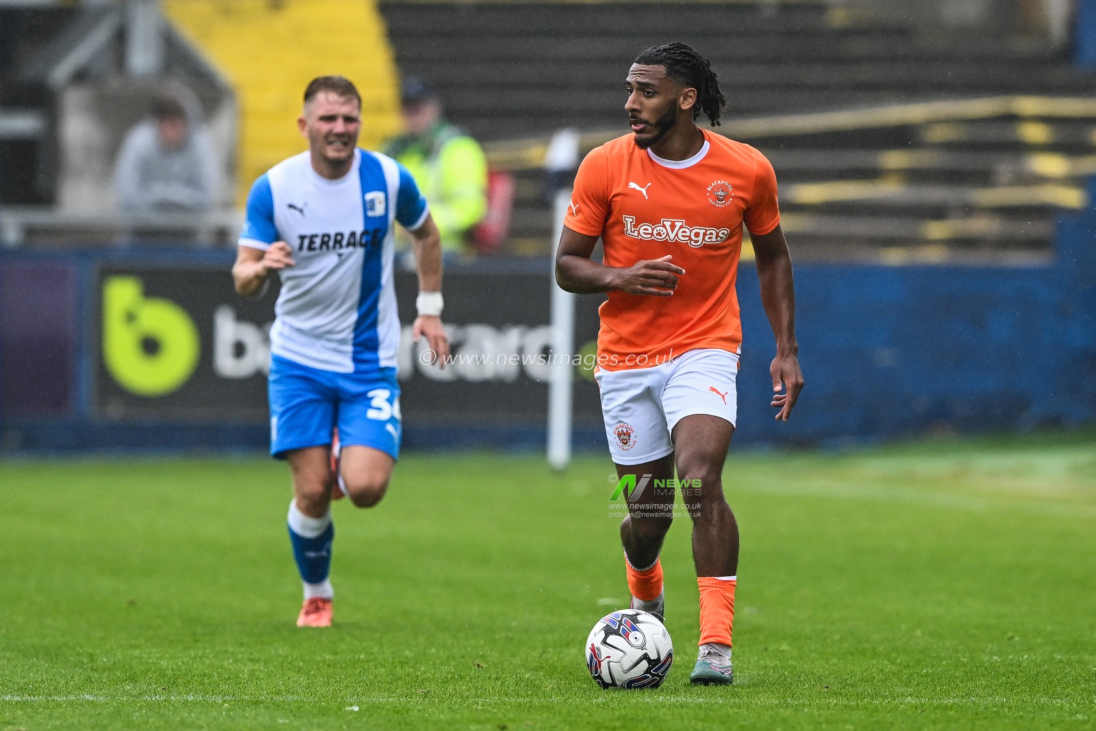 Dominic Thompson #23 of Blackpool makes a break with the ball  during the Pre-season friendly match Barrow vs Blackpool at SO Legal Stadium, Barrow-in-Furness, United Kingdom, 22nd July 2023

(Photo by Craig Thomas/News Images)