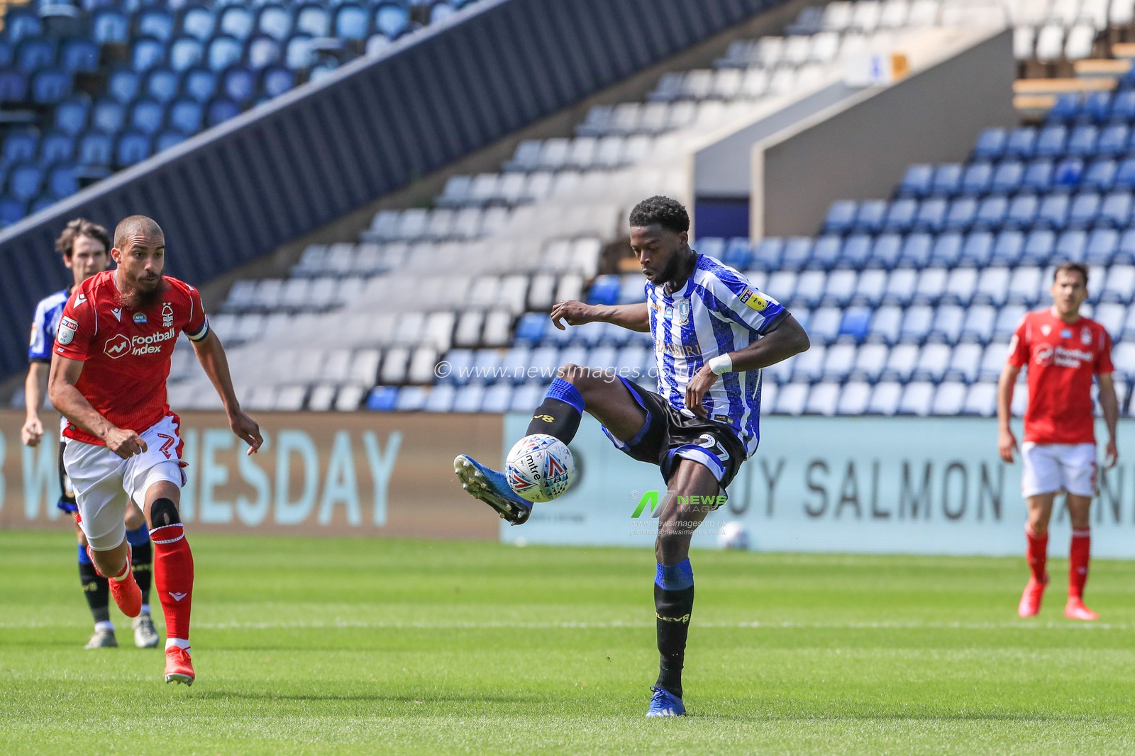 Dominic Iorfa (27) of Sheffield Wednesday controls the ball in his defensive half