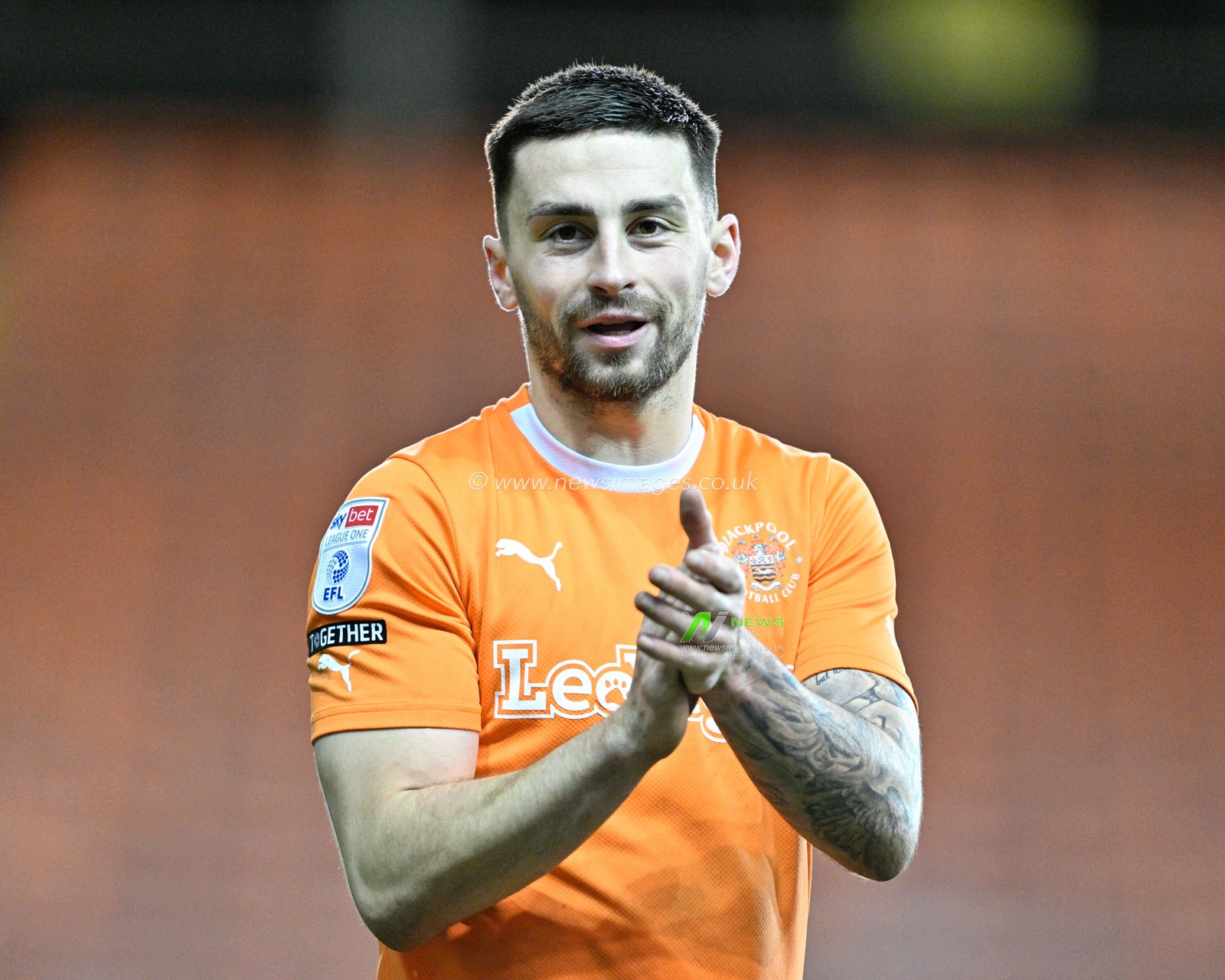 Owen Dale of Blackpool claps fans at full time, during the Bristol Street Motors Trophy match Blackpool vs Burton Albion at Bloomfield Road, Blackpool, United Kingdom, 10th January 2024

(Photo by Cody Froggatt/News Images)