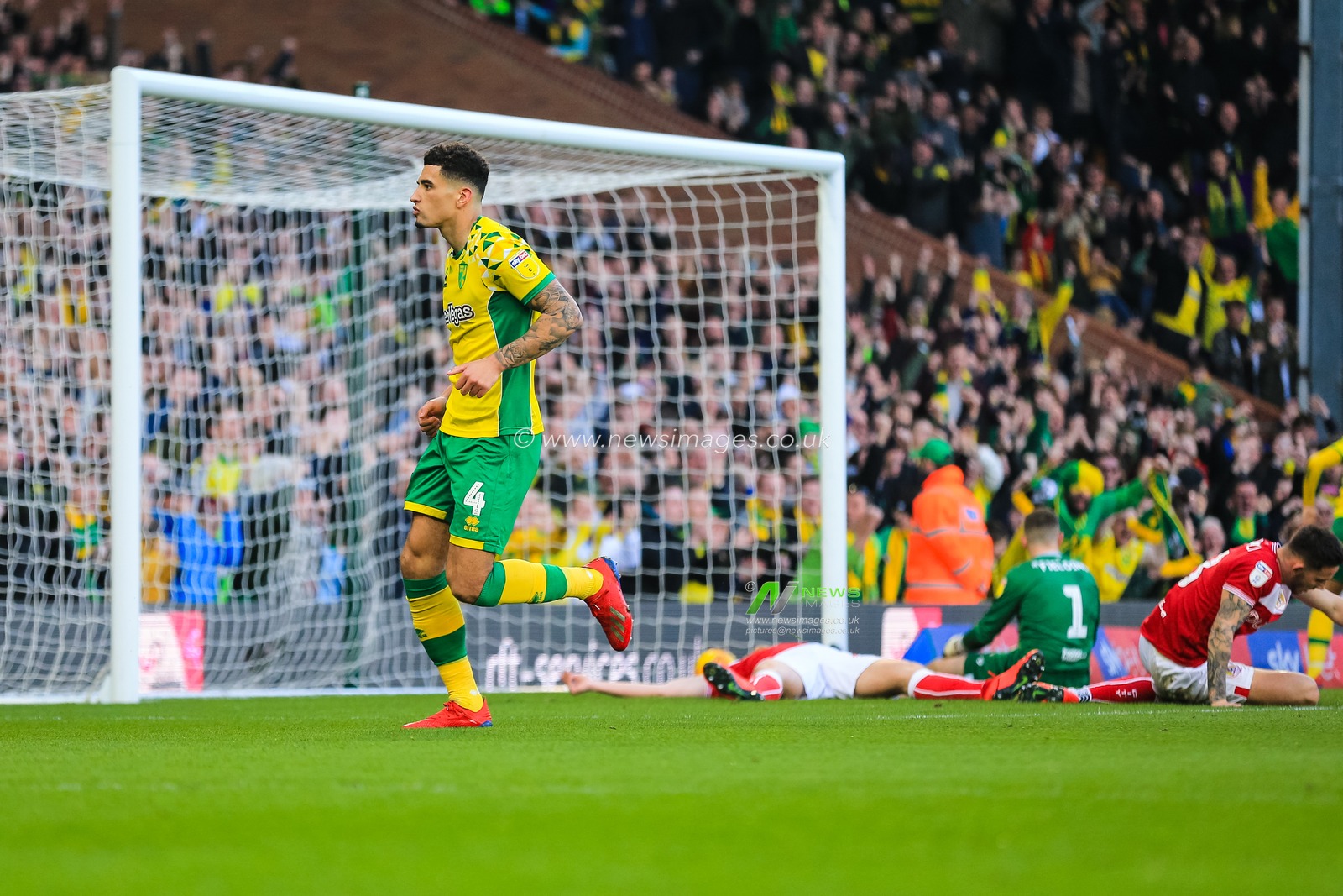 23rd February 2019, Carrow Road, Norfolk, England; Sky Bet Championship, Norwich City vs Bristol City ;  Ben Godfrey (04) of Norwich City celebrates levelling the scores at 2-2.


Credit: Georgie Kerr/News Images

English Football League images are subject to DataCo Licence