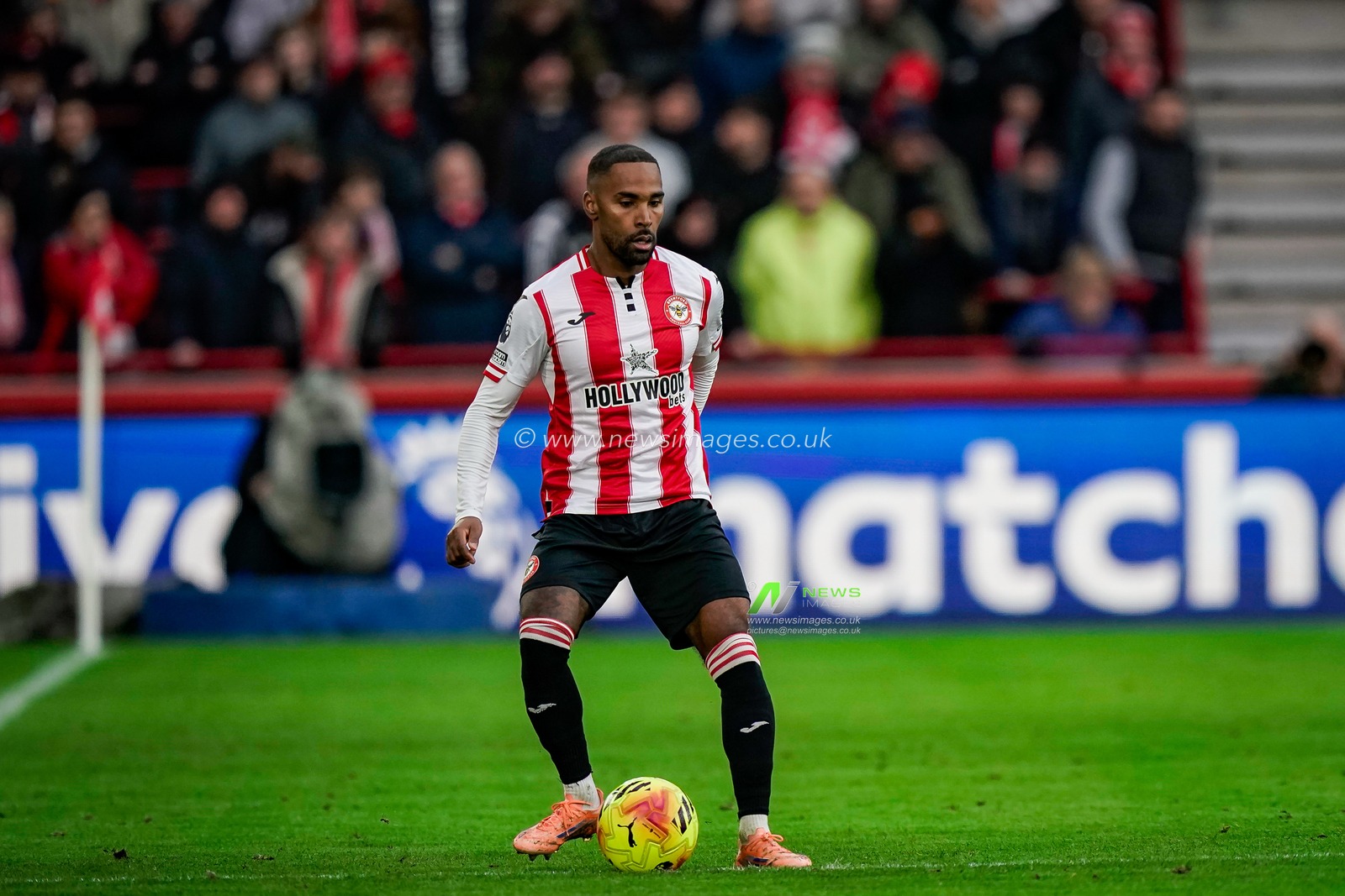 Rico Henry of Brentford passes the ball  during the Premier League match Brentford vs Nottingham Forest at The Gtech Community Stadium, London, United Kingdom, 25th January 2026

(Photo by Maynard Manyowa/News Images)