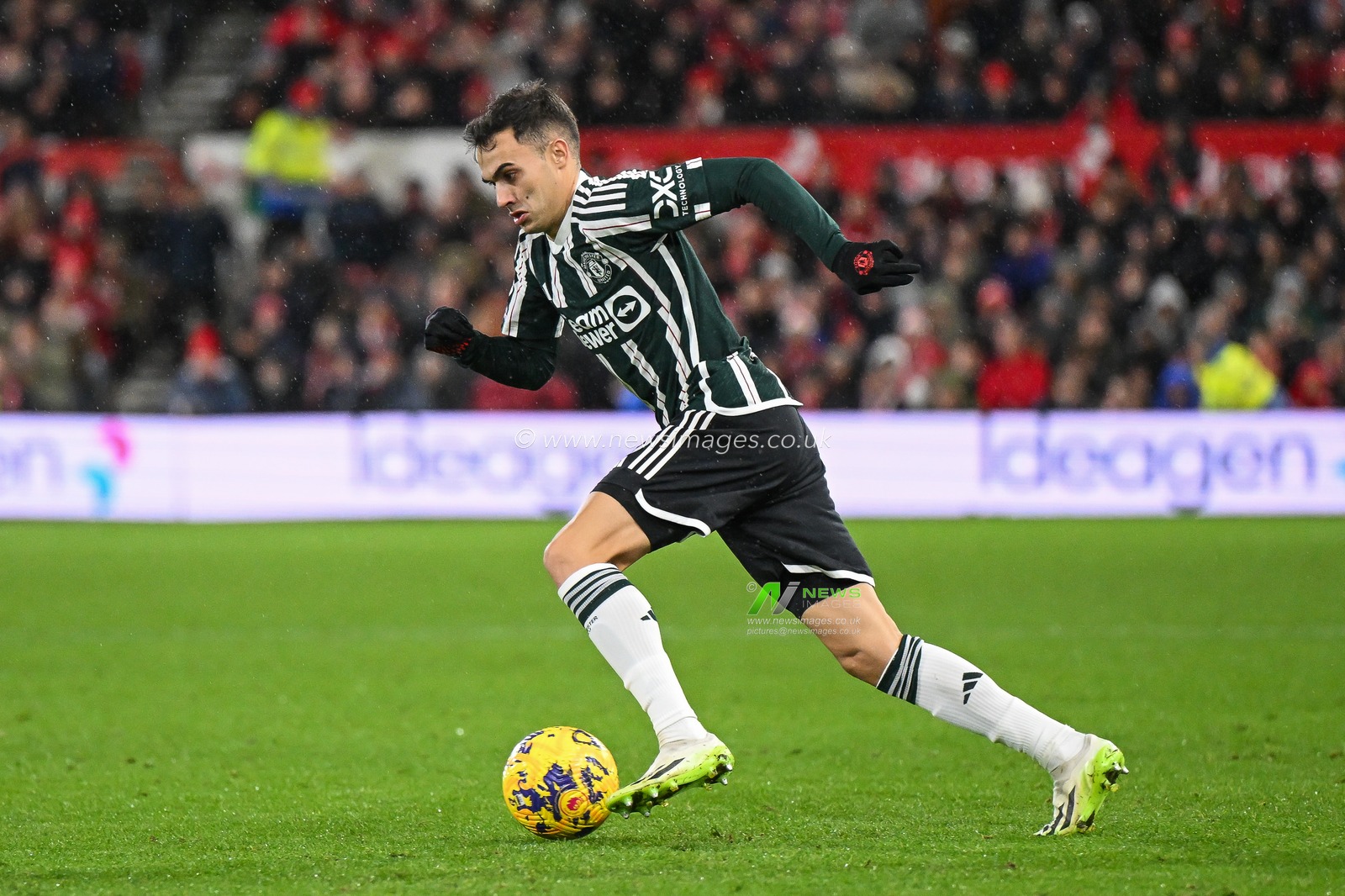 Diogo Dalot of Manchester United makes a break with the ball during the Premier League match Nottingham Forest vs Manchester United at City Ground, Nottingham, United Kingdom, 30th December 2023

(Photo by Craig Thomas/News Images)
