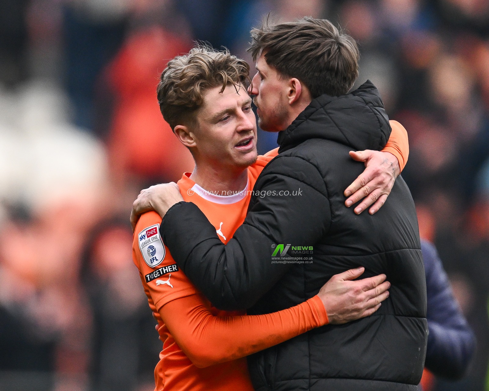 George Byers of Blackpool and Jake Beesley of Blackpool embrace at the end of the Sky Bet League 1 match Blackpool vs Portsmouth at Bloomfield Road, Blackpool, United Kingdom, 9th March 2024

(Photo by Craig Thomas/News Images)