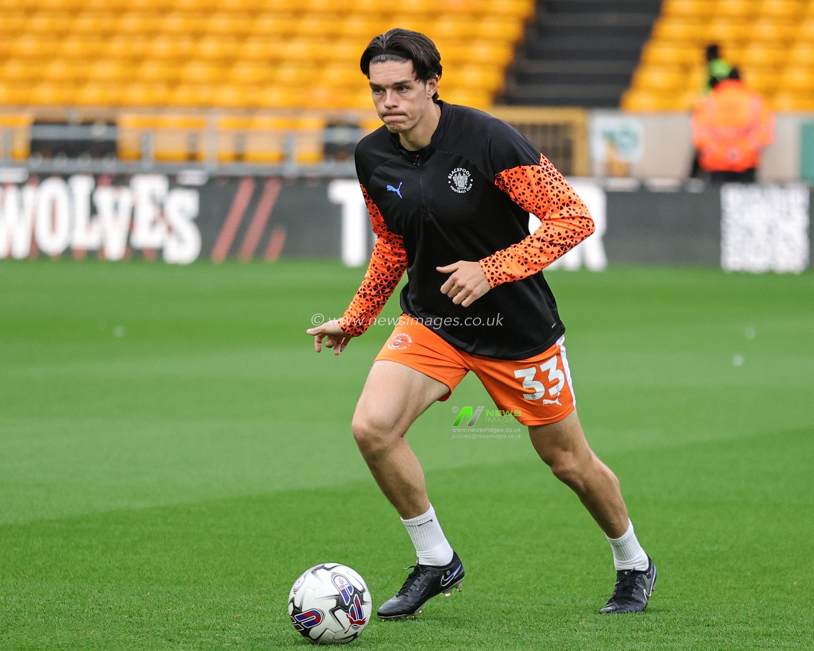 Doug Tharme #33 of Blackpool in the pregame warmup session during the Carabao Cup match Wolverhampton Wanderers vs Blackpool at Molineux, Wolverhampton, United Kingdom, 29th August 2023

(Photo by Mark Cosgrove/News Images)