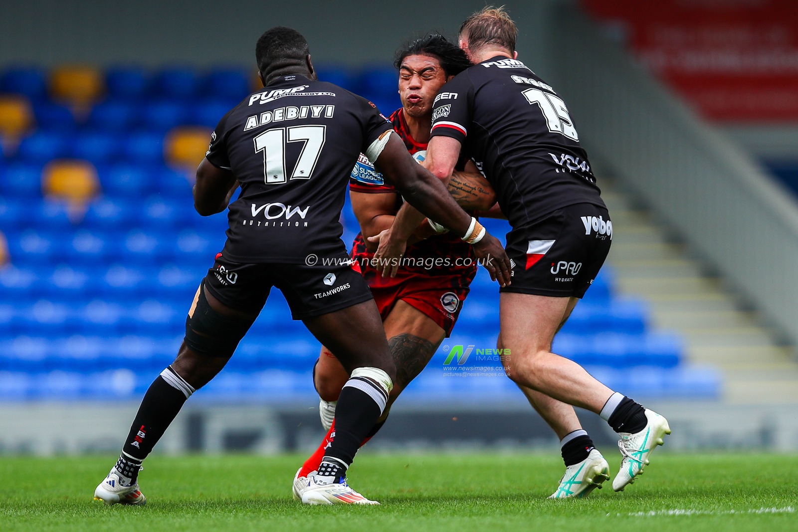 Sadiq Adebiyi and Marcus Stock of London Broncos make a tackle during the Betfred Super League Round 23 match London Broncos vs Leigh Leopards at Plough Lane, Wimbledon, United Kingdom, 25th August 2024

(Photo by Izzy Poles/News Images)