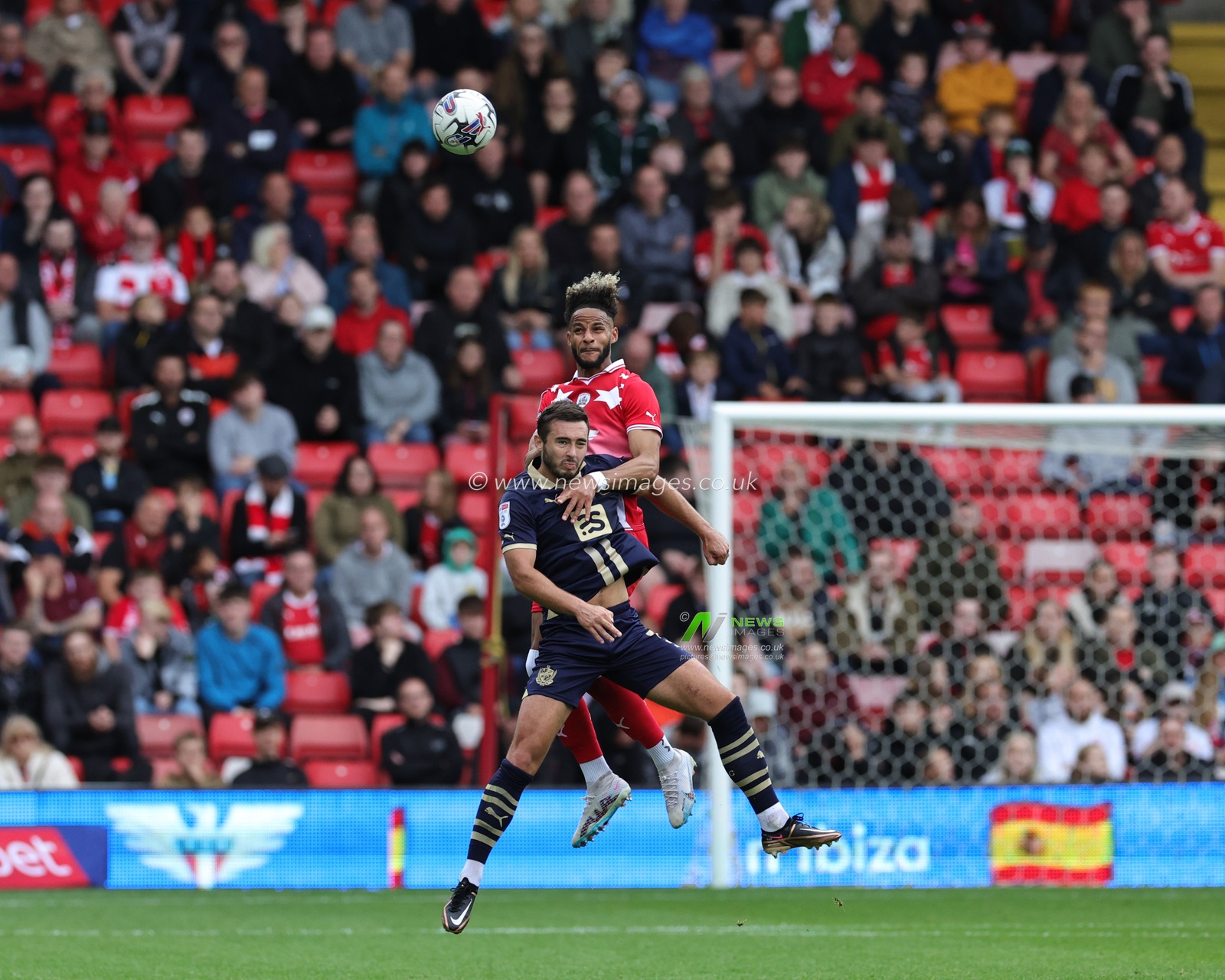 Barry Cotter #17 of Barnsley jumps up to win the high ball during the Sky Bet League 1 match Barnsley vs Port Vale at Oakwell, Barnsley, United Kingdom, 5th August 2023

(Photo by Mark Cosgrove/News Images)