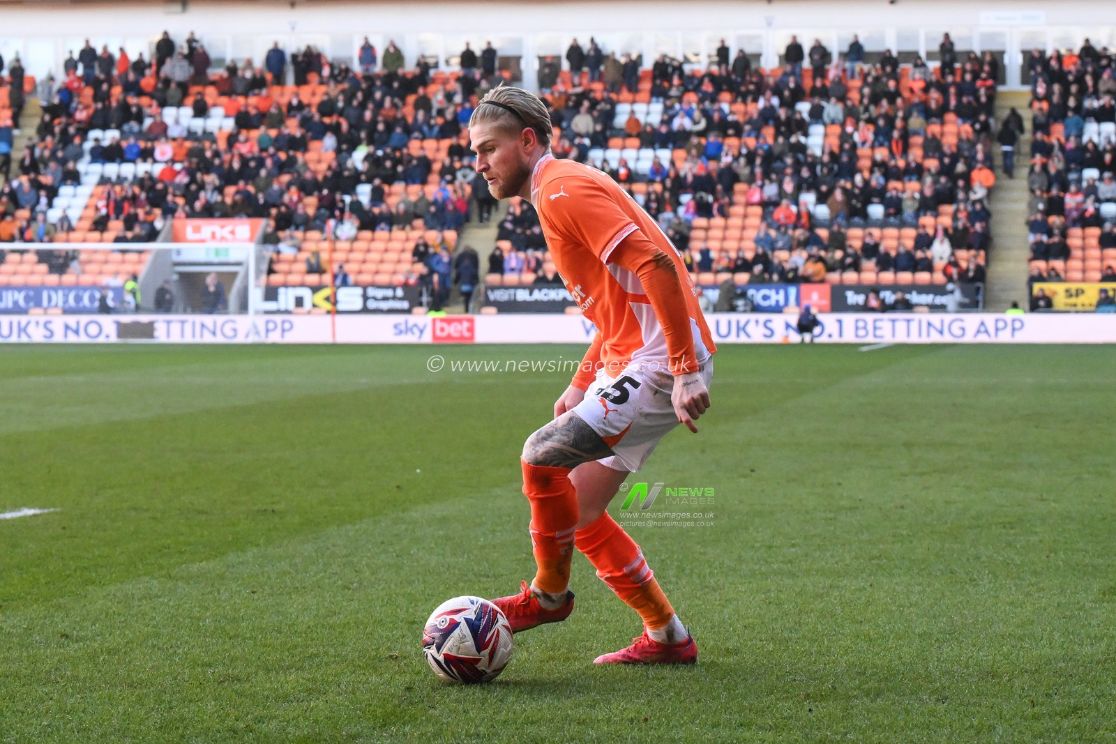Hayden Coulson of Blackpool makes a break with the ball during the Sky Bet League 1 match Blackpool vs Leyton Orient at Bloomfield Road, Blackpool, United Kingdom, 15th March 2025

(Photo by Craig Thomas/News Images)