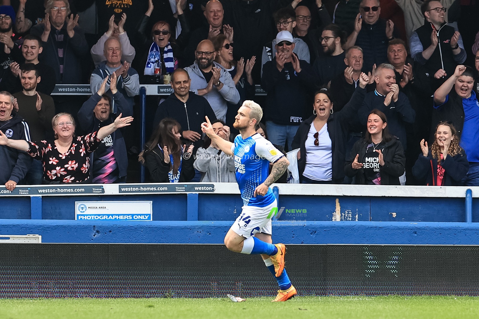Jack Marriott #14 of Peterborough United celebrates his goal to make it 4-0
