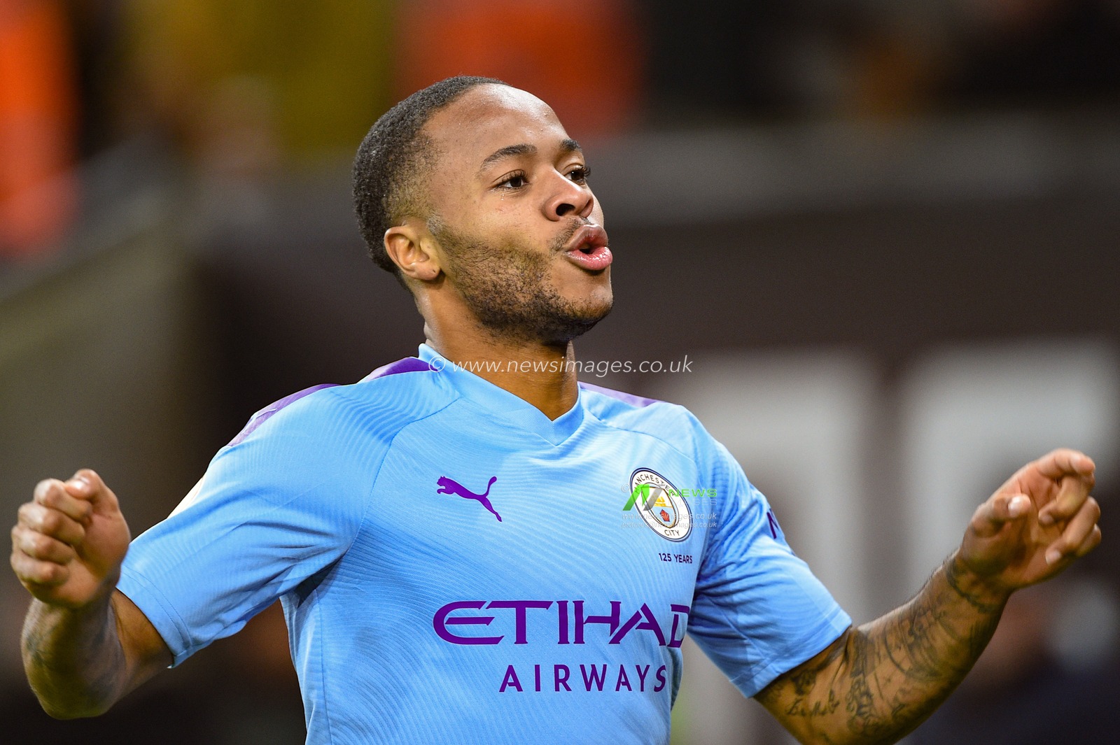 27th December 2019, Molineux, Wolverhampton, England; Premier League, Wolverhampton Wanderers v Manchester City : Raheem Sterling (7) of Manchester City celebrates making it 0-2

Credit: Richard Long/News Images