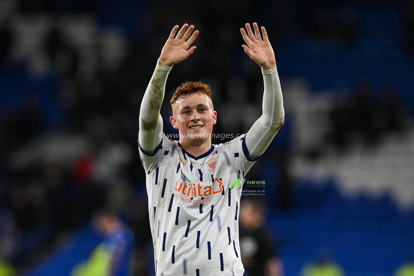 Sonny Carey #16 of Blackpool waves to the travelling fans  at the end of the Sky Bet Championship match Cardiff City vs Blackpool at Cardiff City Stadium, Cardiff, United Kingdom, 17th December 2022

(Photo by Craig Thomas/News Images)