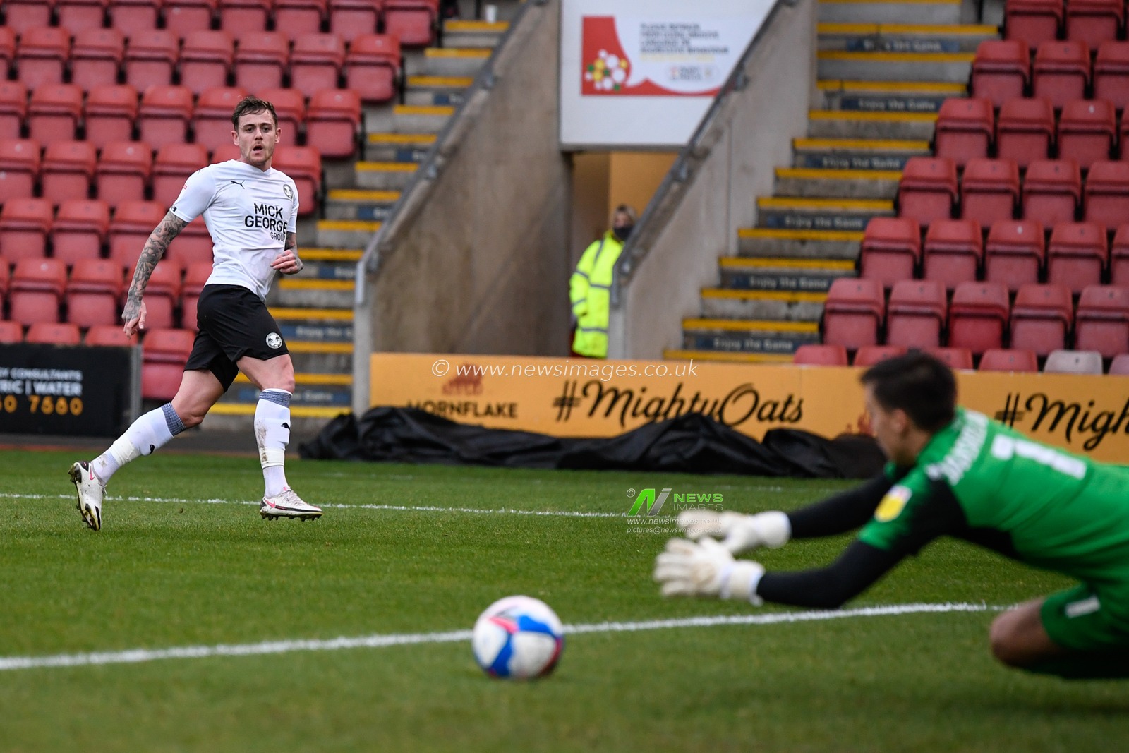 Sammie Szmodics #15 of Peterborough United has a shot at goal
