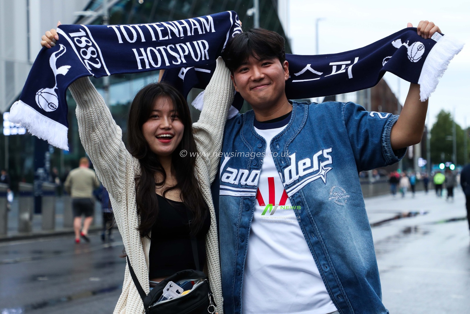 Tottenham fans pose for a photo outside of Tottenham Hotspur Stadium prior to the Premier League match Tottenham Hotspur vs Everton at Tottenham Hotspur Stadium, London, United Kingdom, 24th August 2024

(Photo by Izzy Poles/News Images)