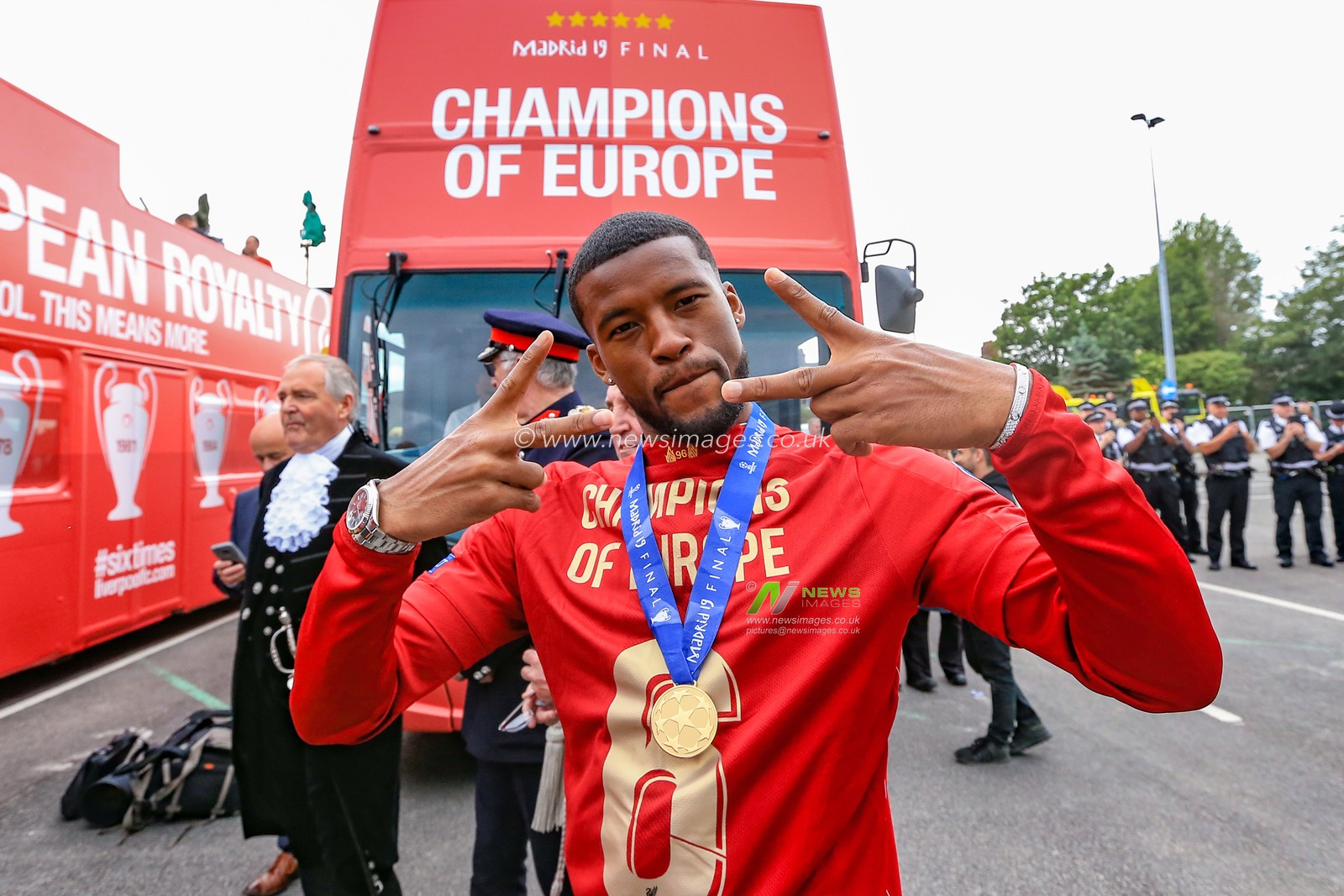 2nd June 2019 , Liverpool, England; UEFA Champions League, Liverpool FC Champions League winners celebrations and open top bus parade ; Georginio Wijnaldum (05) of Liverpool 


Credit: Mark Cosgrove/News Images