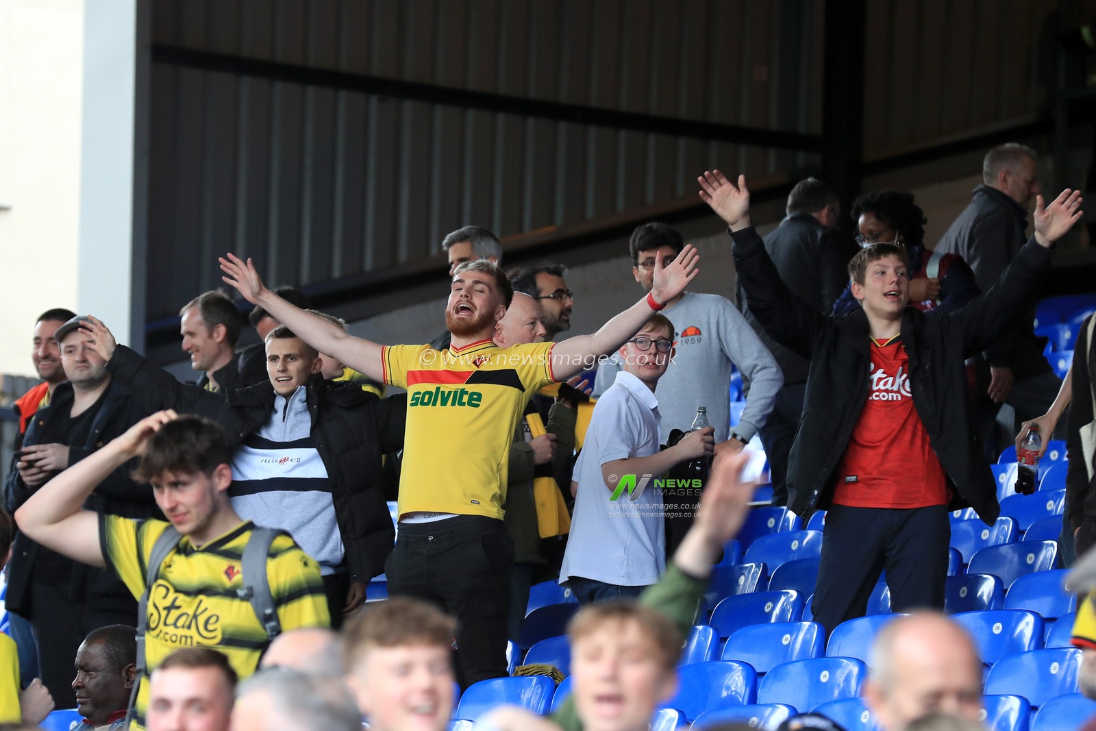 Watford fans in celebratory mood despite their relegation.