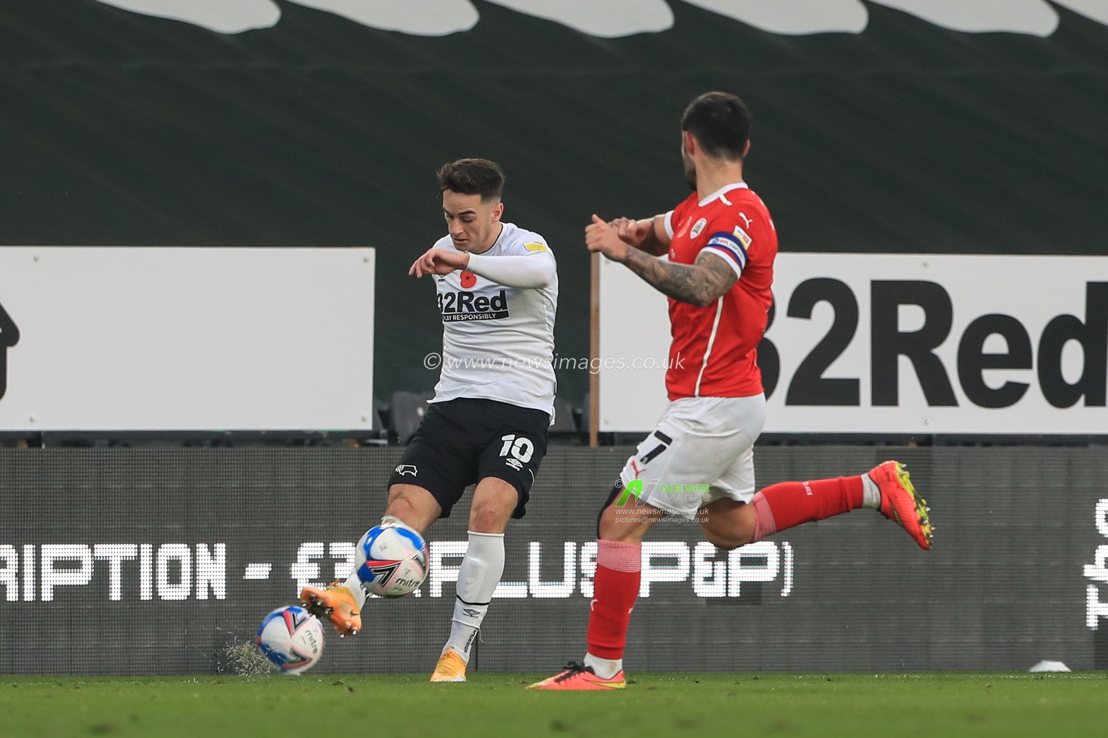 Tom Lawrence #10 of Derby County crosses the ball
