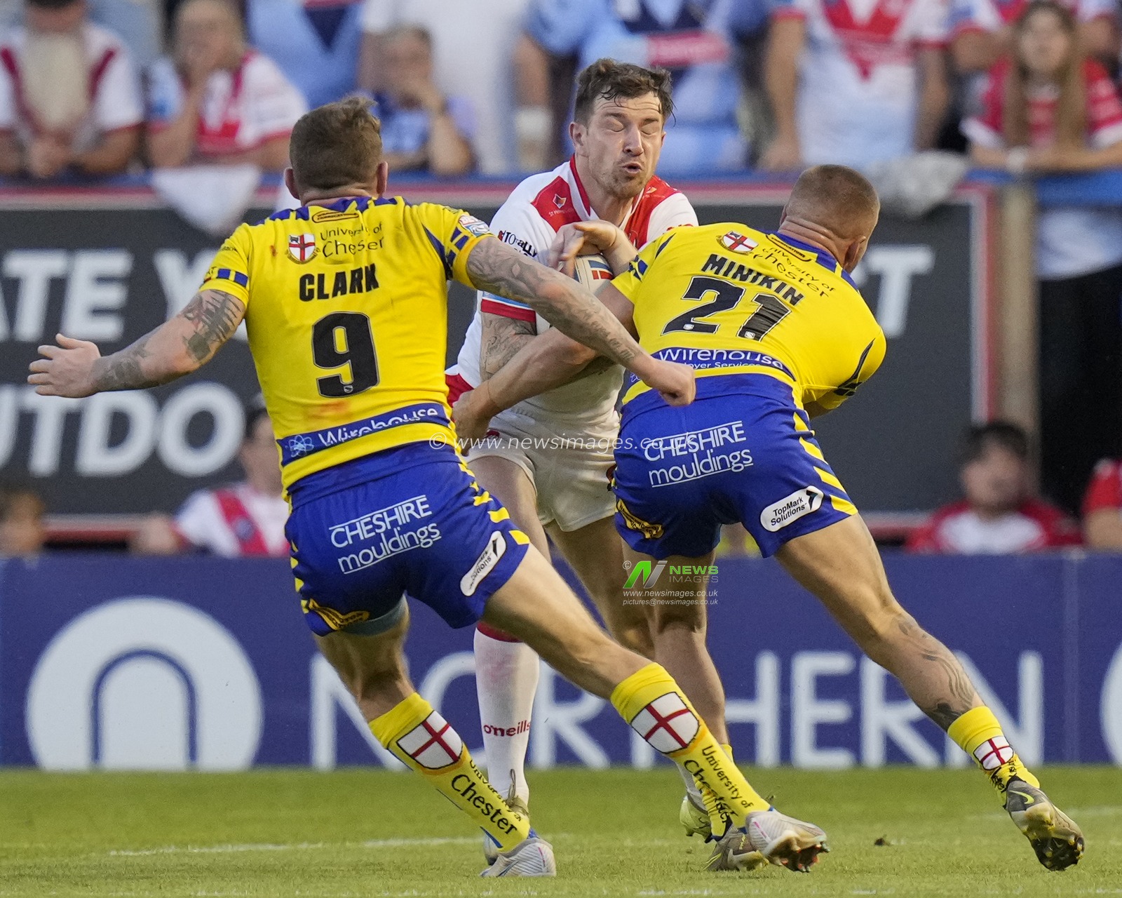 Mark Percival #4 of St. Helens runs at Greg Minikin #21 of Warrington Wolves during the Betfred Super League Round 18 match Warrington Wolves vs St Helens at Halliwell Jones Stadium, Warrington, United Kingdom, 7th July 2023

(Photo by Steve Flynn/News Images)