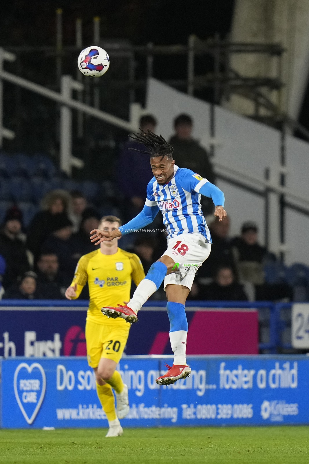 David Kasumu #18 of Huddersfield Town heads clear during the Sky Bet Championship match Huddersfield Town vs Preston North End at John Smith's Stadium, Huddersfield, United Kingdom, 18th October 2022

(Photo by Steve Flynn/News Images)