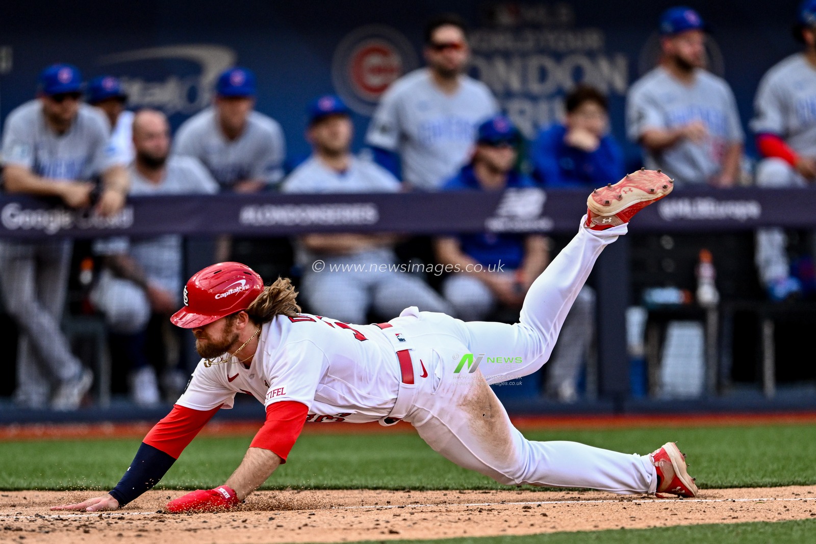 Brendan Donovan #33 of the St. Louis Cardinals dives onto home plate during the 2023 MLB London Series match St. Louis Cardinals vs Chicago Cubs at London Stadium, London, United Kingdom, 25th June 2023

(Photo by Craig Thomas/News Images)