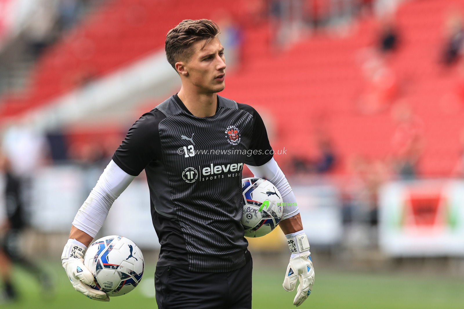 Stuart Moore #13 of Blackpool during the pre-game warmup