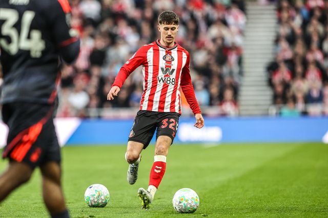 Trai Hume of Sunderland clears a ball as play is pulled back for 2 balls being on the pitch during the Premier League match Sunderland vs Nottingham Forest at Stadium Of Light, Sunderland, United Kingdom on 24 April 2026

(Photo by Alfie Cosgrove/News Images)