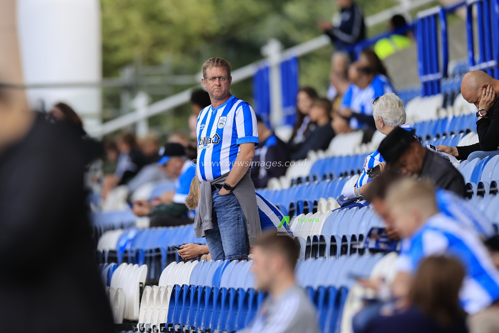 Huddersfield fan early into the stadium ahead of the Sky Bet Championship match Huddersfield Town vs Leicester City at John Smith's Stadium, Huddersfield, United Kingdom, 12th August 2023

(Photo by Conor Molloy/News Images)