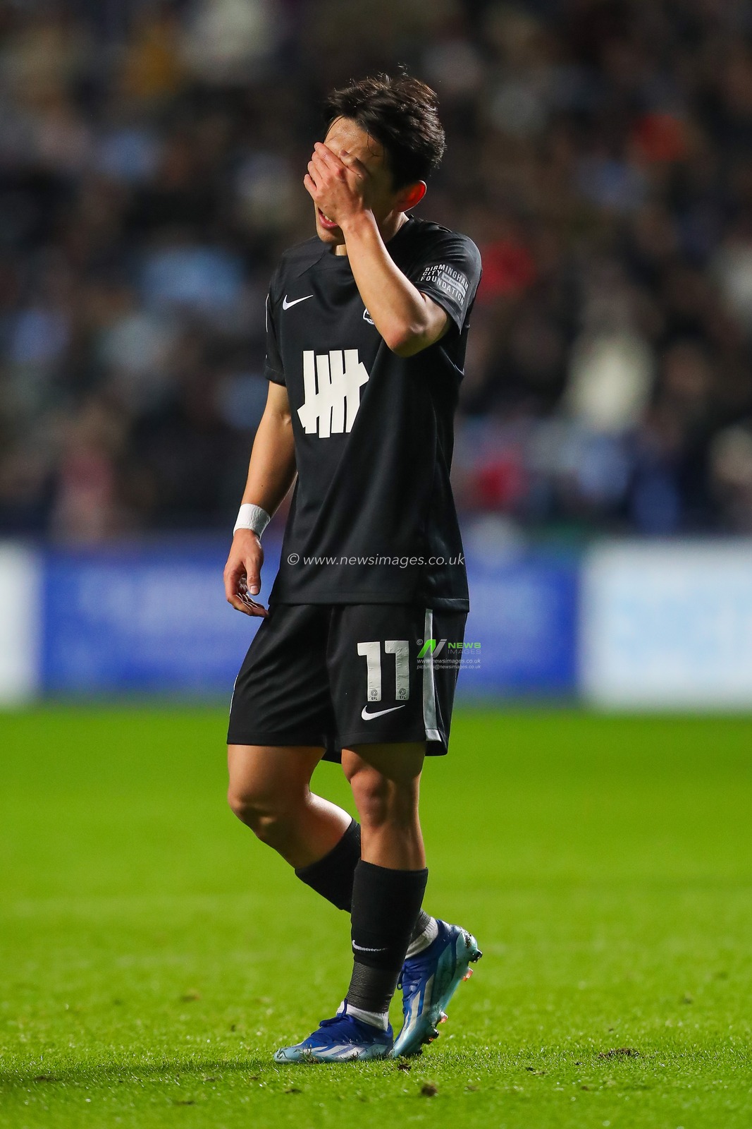 Koji Miyoshi #11 of Birmingham City rubs his forehead during the Sky Bet Championship match Coventry City vs Birmingham City at Coventry Building Society Arena, Coventry, United Kingdom, 8th December 2023

(Photo by Gareth Evans/News Images)