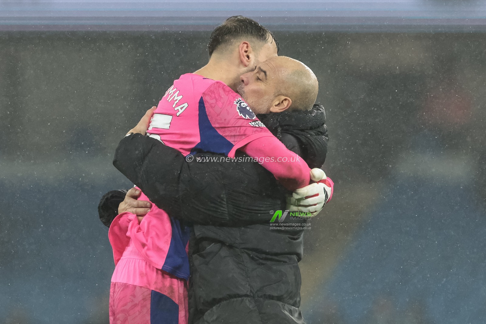 Manchester City goalkeeper Gianluigi Donnarumma embraces Pep Guardiola manager of Manchester City during the Premier League match Manchester City vs Fulham at Etihad Stadium, Manchester, United Kingdom on 11 February 2026

(Photo by Mark Cosgrove/News Images)