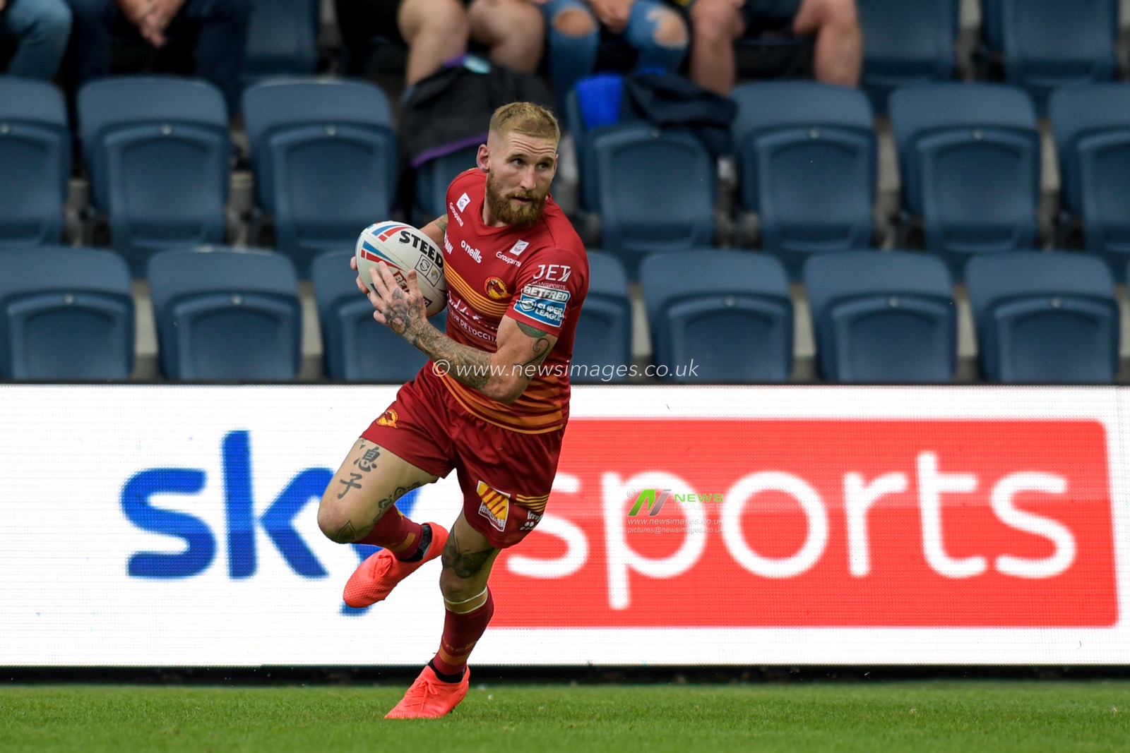 Sam Tomkins (29) of Catalans Dragons in action during the game