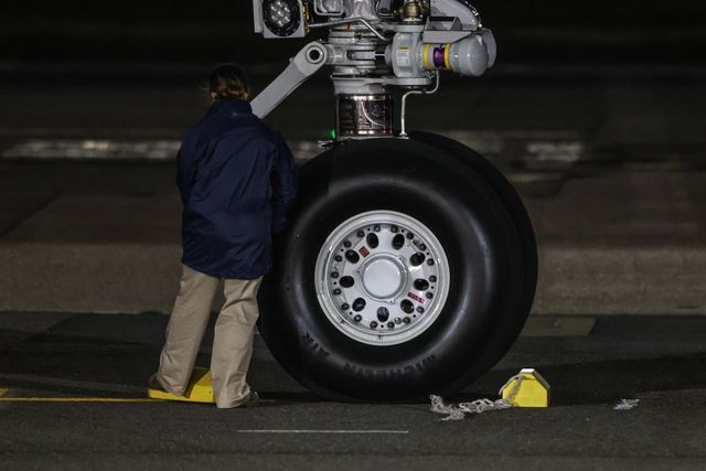 Ground staff prep the chocks for the landing gear of the Air Force One during the US President Donald Trump's state visit to the United Kingdom at London Stansted Airport, Stansted, United Kingdom, 16th September 2025

(Photo by Alfie Cosgrove/News Images)