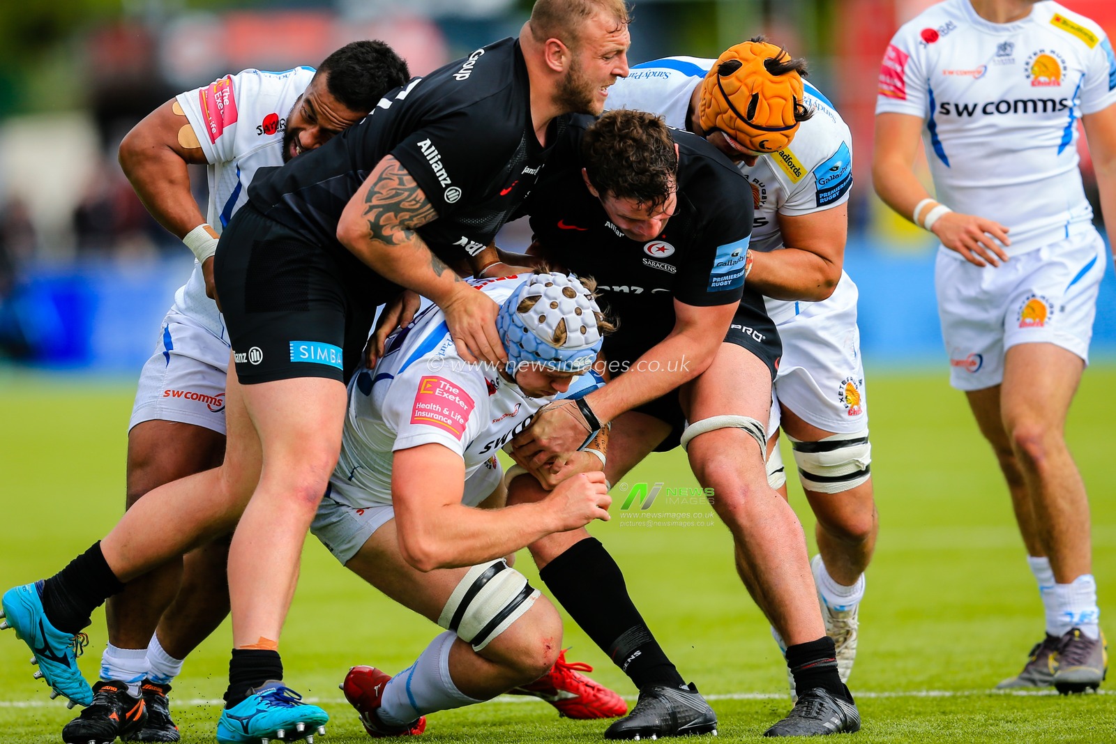 4th May 2019 , Allianz Park , London, England; Gallagher Premiership, Saracens vs Exeter Chiefs ; Richard Capstick (07) of Exeter receives a tackle from Hayden Thompson-Stringer (17) of Saracens


Credit: Georgie Kerr/News Images