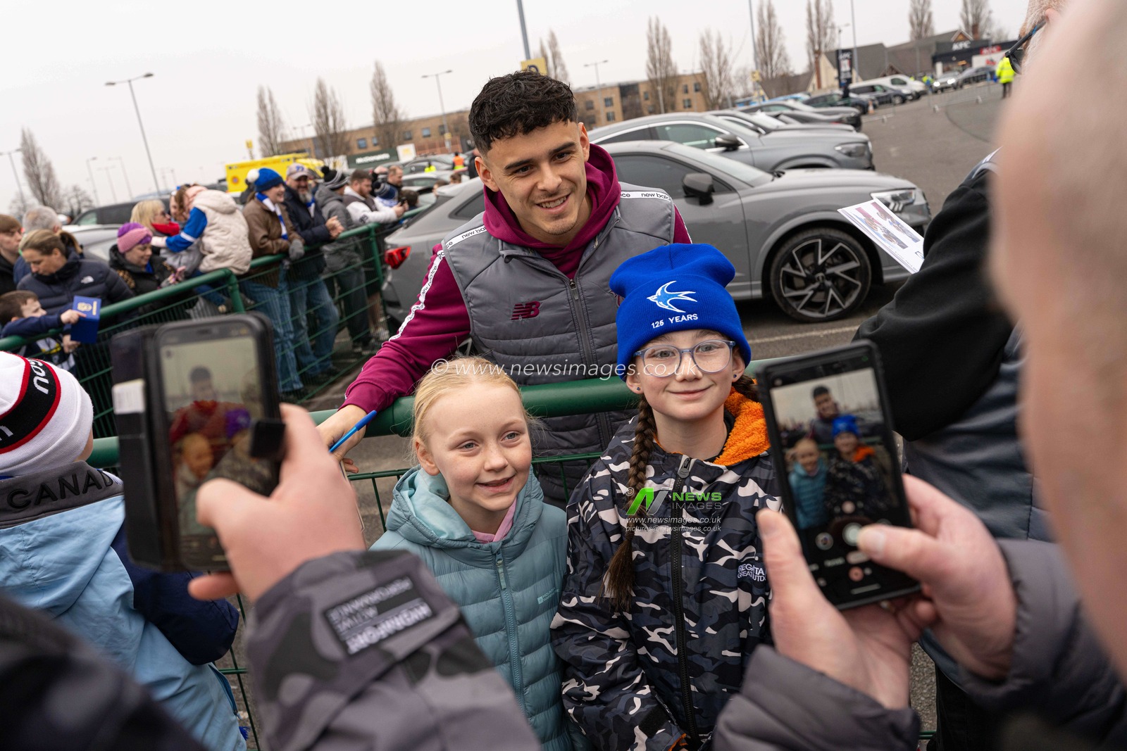 Alex Robertson of Cardiff City poses for a photograph with Cardiff City fans, ahead of the Sky Bet Championship match Cardiff City vs Swansea City at Cardiff City Stadium, Cardiff, United Kingdom, 18th January 2025

(Photo by Andrew Lewis/News Images)