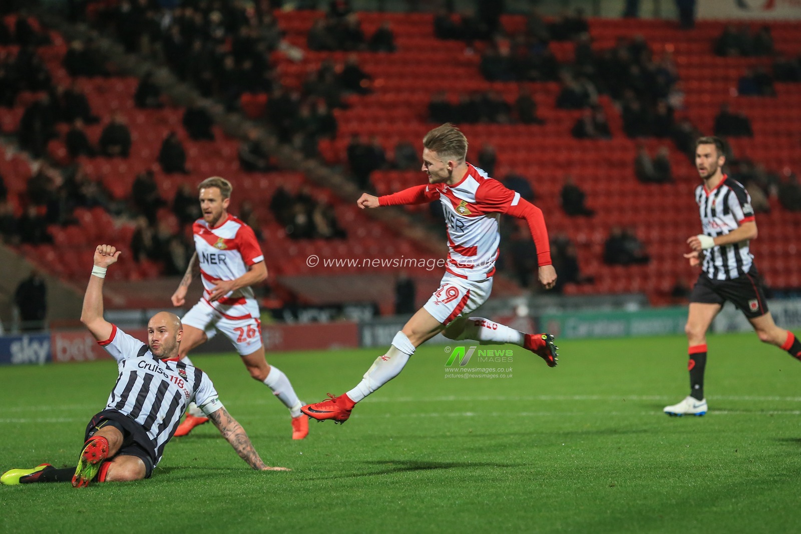 20th November 2018, Keepmoat Stadium, Doncaster, England; The Emirates FA Cup, Round 1, Doncaster Rovers v Chorley ; Alfie May (19) of Doncaster scores to make it  4-0
Credit: Mark Cosgrove/News Images

English Football League images are subject to DataCo Licence