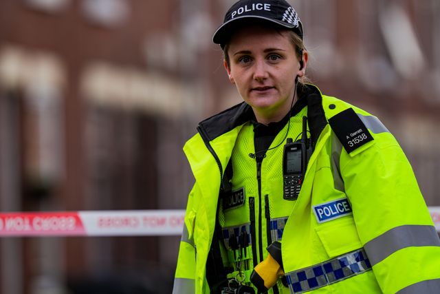 Police officers man a cordon on Cambridge Street, Derby, during a Major Explosives Incident in Derby that began on Thursday December 4 when police executed a warrant at an address on Vulcan Street, Derby, that saw two men arrested on suspicion of explosives offences and 200 homes evacuated (Maynard Manyowa / News Images)