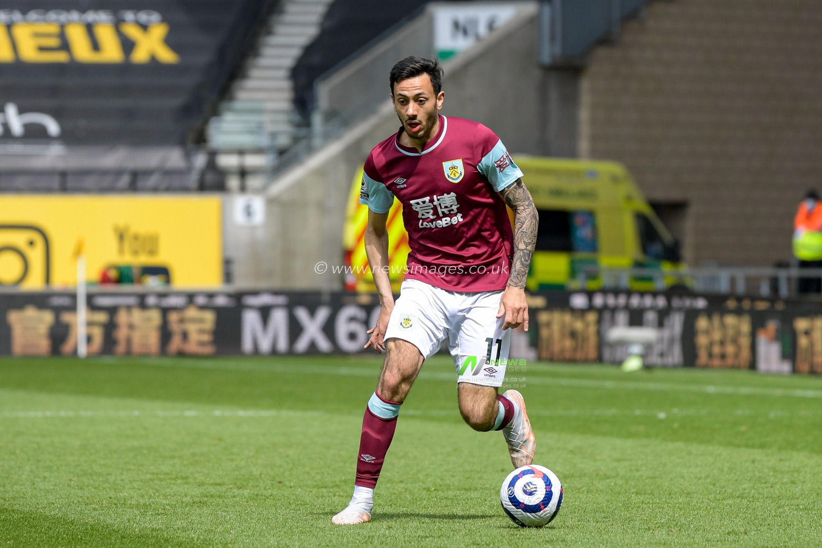 Dwight McNeil #11 of Burnley in action during the game