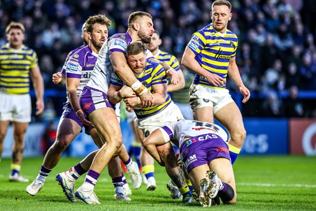 Luke Yates of Warrington Wolves is tackled by Isaiah Vagana of Wakefield Trinity during the Betfred Super League Round 3 match Warrington Wolves vs Wakefield Trinity at The Halliwell Jones Stadium, Warrington, United Kingdom on 28 February 2026

(Photo by Alfie Cosgrove/News Images)