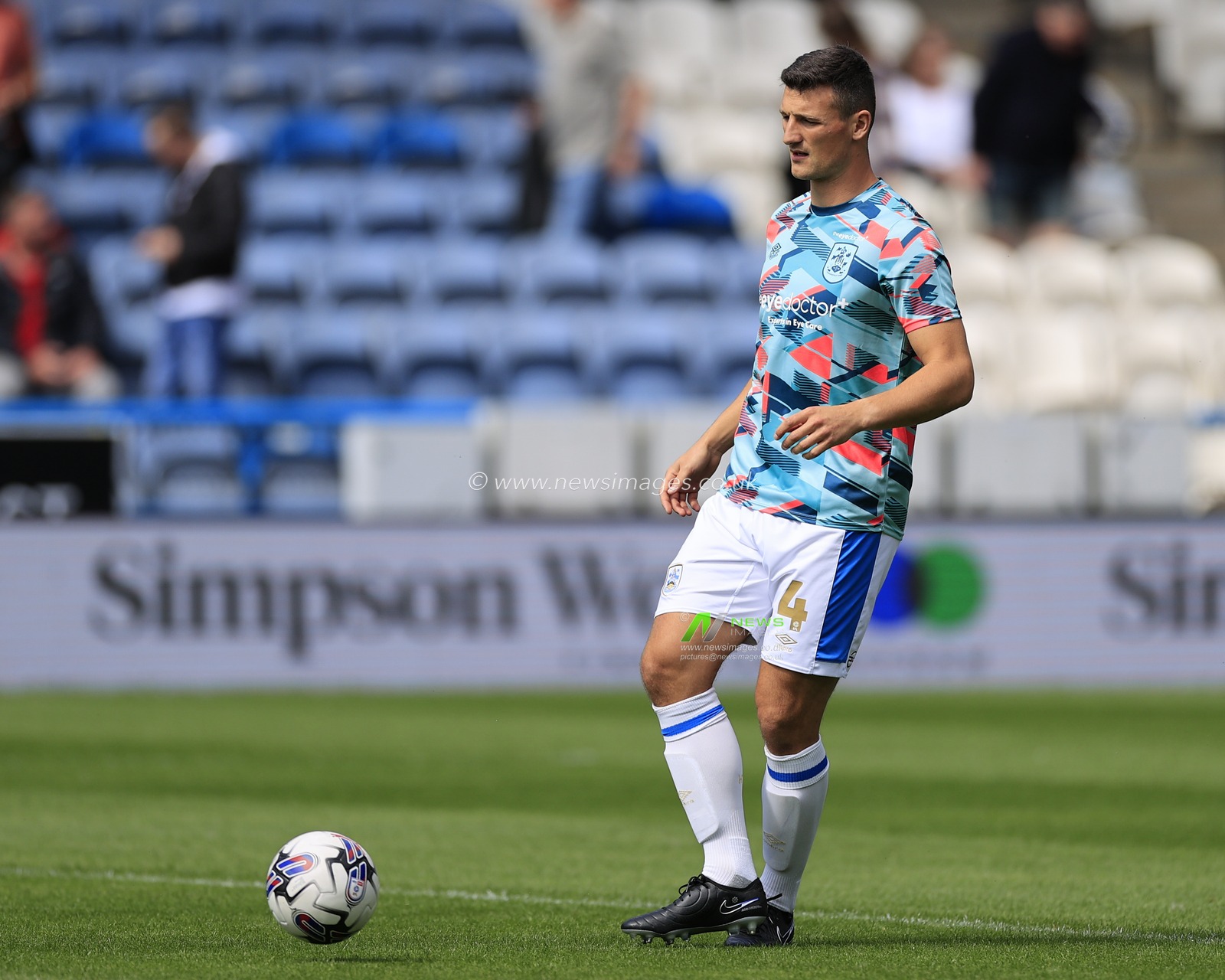 Matty Pearson #4 of Huddersfield Town during the warm up ahead of the Sky Bet Championship match Huddersfield Town vs Leicester City at John Smith's Stadium, Huddersfield, United Kingdom, 12th August 2023

(Photo by Conor Molloy/News Images)