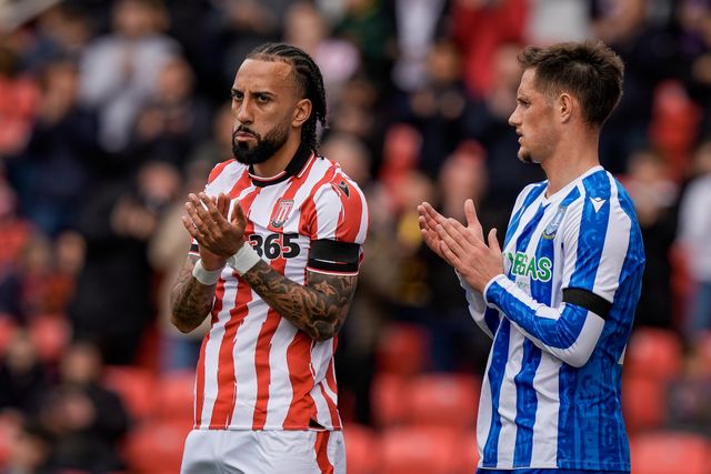 Sorba Thomas of Stoke City and Jerry Yates of Sheffield Wednesday applaud in the 8th minute in memory of Oliver Royles during the Sky Bet Championship match Stoke City vs Sheffield Wednesday at Bet365 Stadium, Stoke On Trent, United Kingdom on 03 April 2026

(Photo by Maynard Manyowa/News Images)
