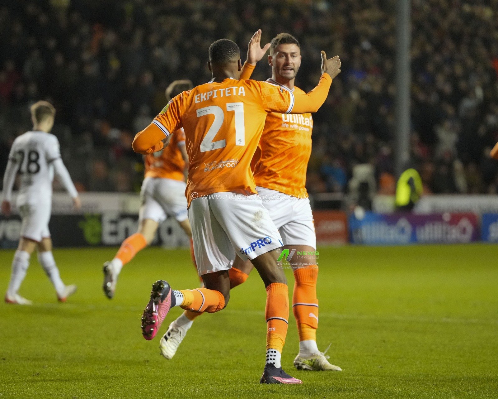Gary Madine #14 of Blackpool celebrates with goalscorer  Marvin Ekpiteta after making it 1-2during the Sky Bet Championship match Blackpool vs Sheffield United at Bloomfield Road, Blackpool, United Kingdom, 29th December 2022

(Photo by Steve Flynn/News Images)